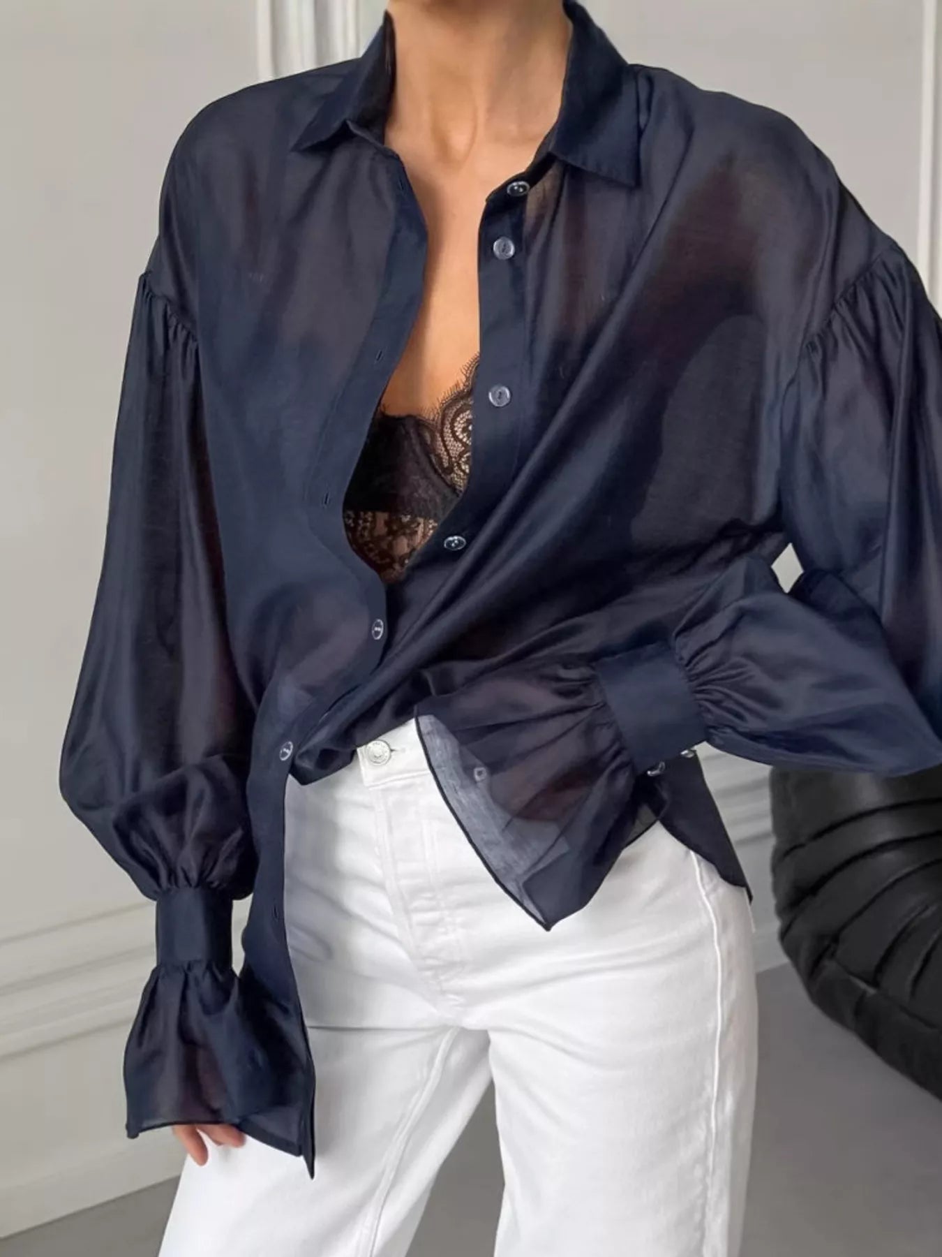 Button Up Flounce Sleeve Shirt displayed in navy blue, featuring buttoned front and elegant flounce sleeves.