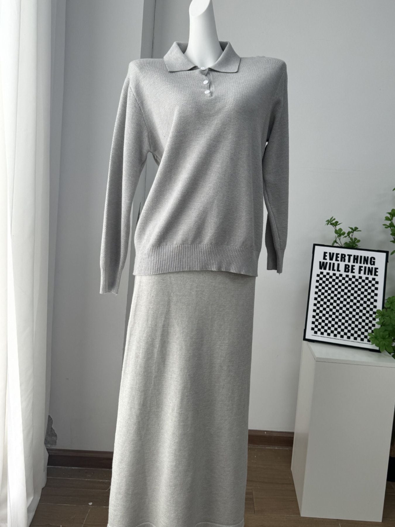 Polo Collar Knit Two Piece Set featuring a buttoned, slightly stretchy gray top and skirt, perfect for casual wear.