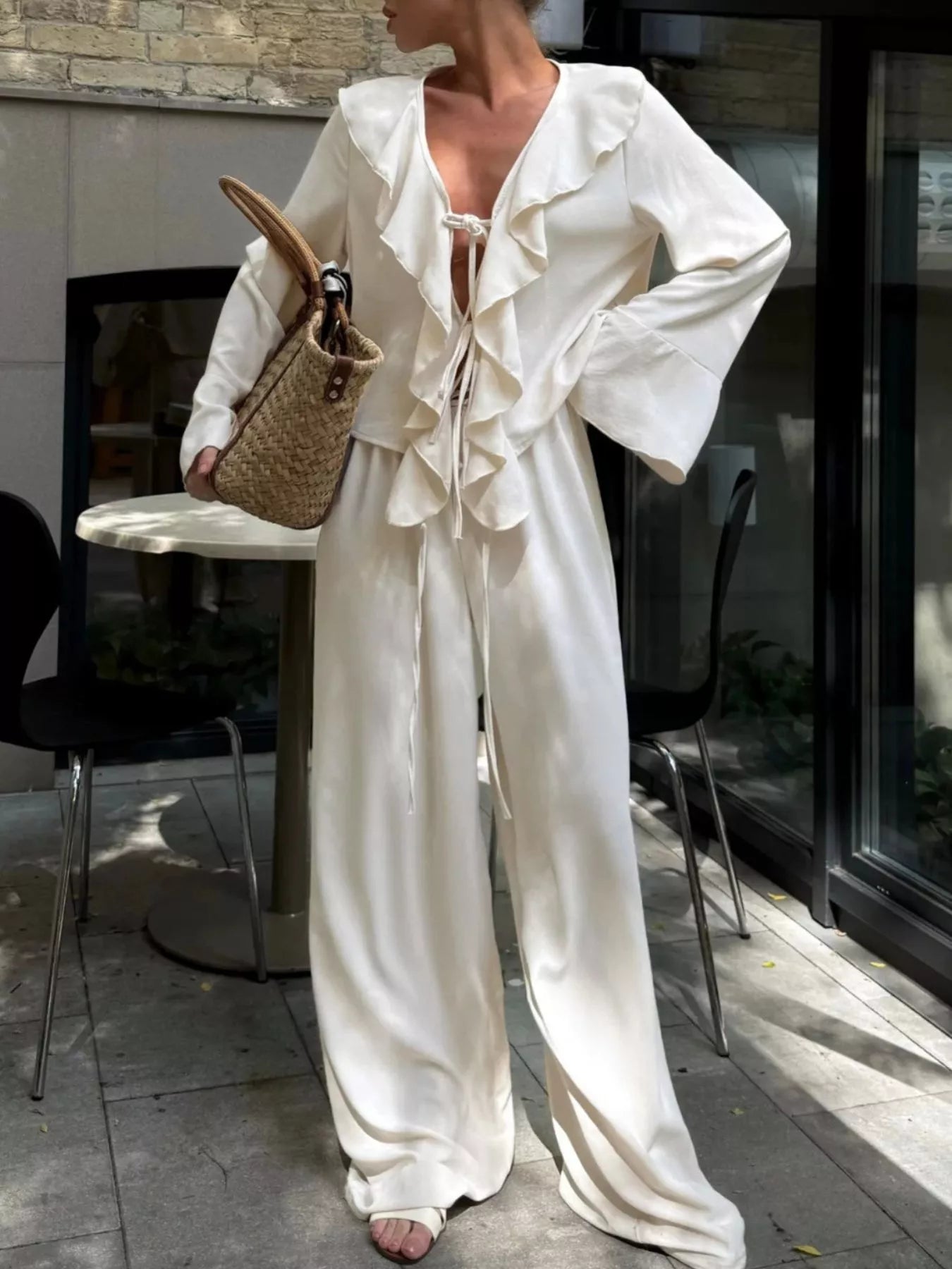 Ruffle Trim Tie Front Top and Pants Set for Women featuring ruffle details and tied front, stylish and elegant.