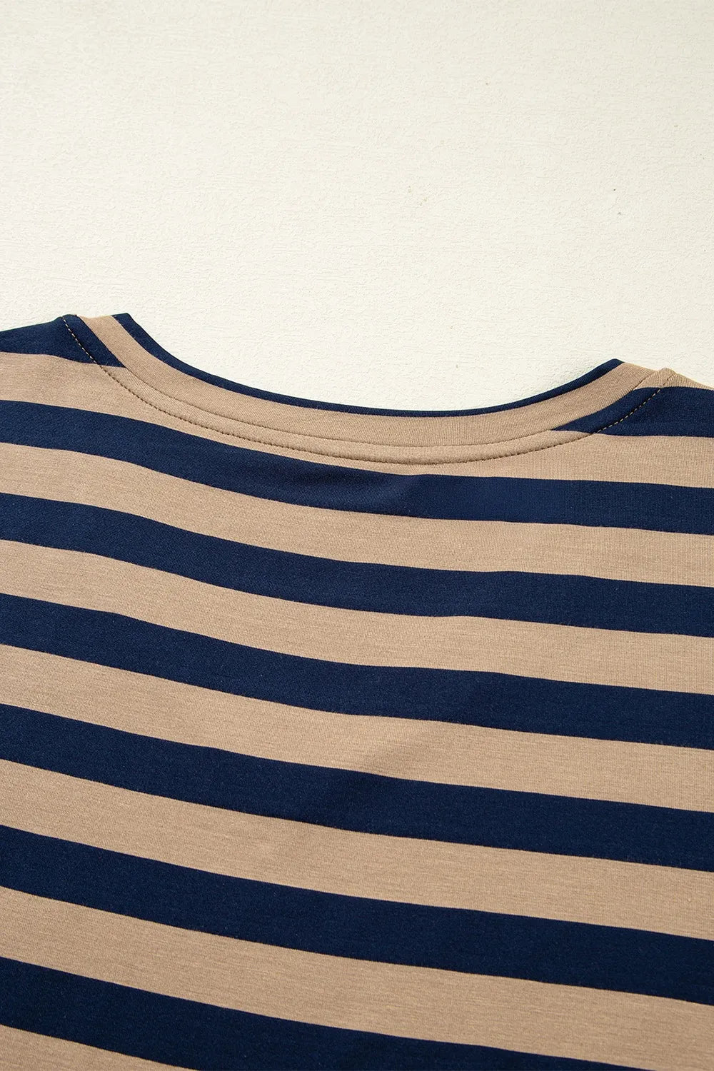 Casual Striped V-Neck Midi T-Shirt Dress showing the striped pattern and neckline details for everyday style.