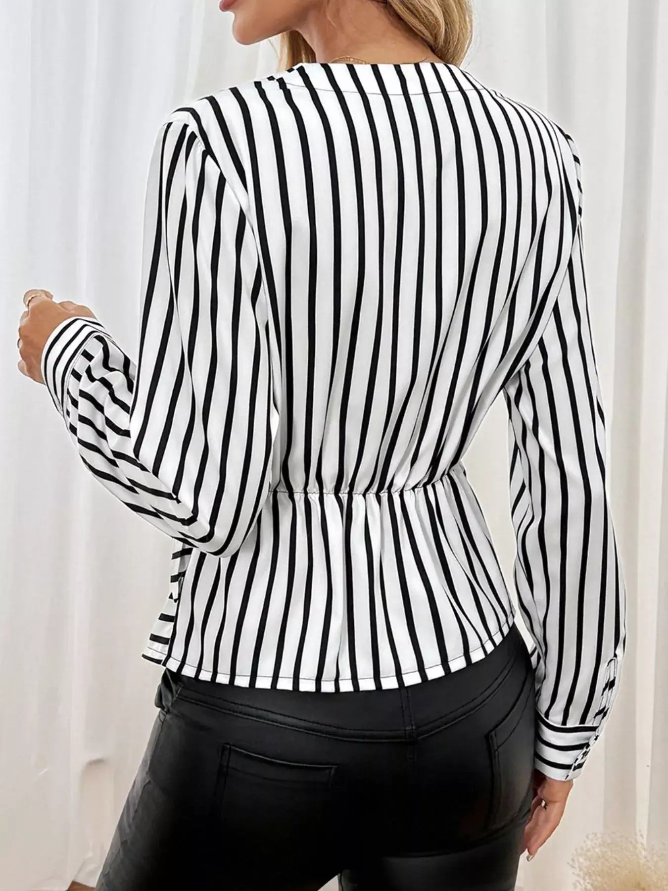 Back view of the Striped Color Block Surplice Shirt, featuring bold stripes and a fitted silhouette.