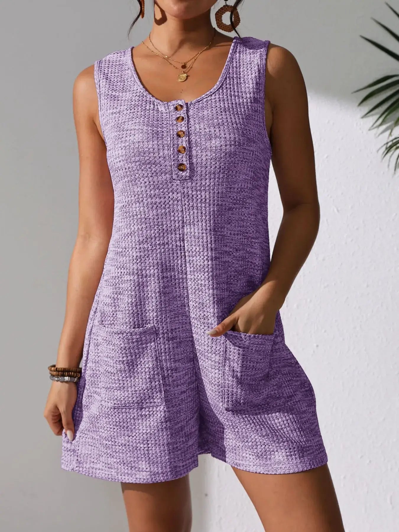 Full Size Button Front Romper with Pockets in purple with button front and side pockets, perfect for casual summer wear.