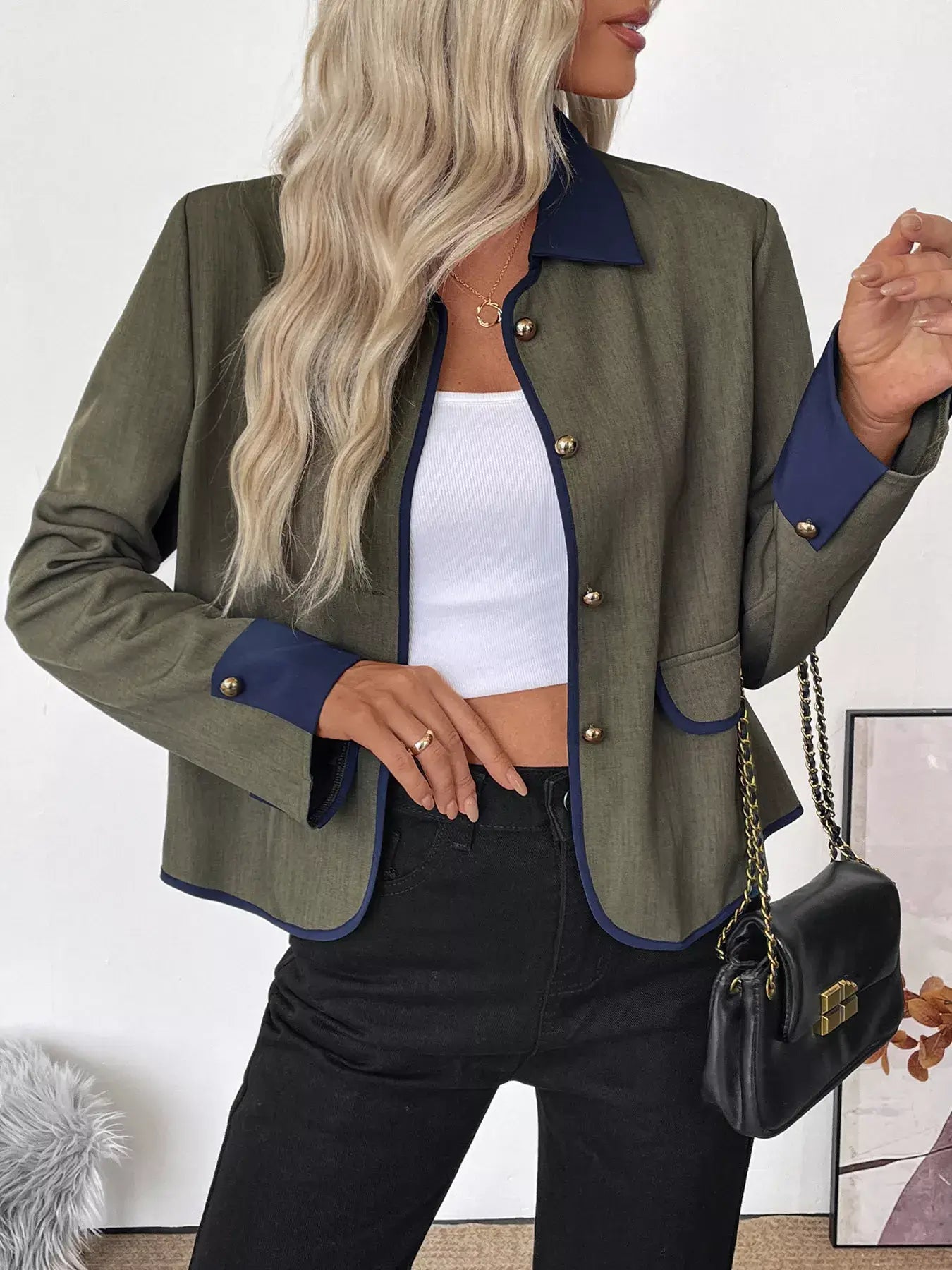 Woman wearing a stylish Contrast Trim Button-Up Jacket, featuring a tailored fit and modern elegance.