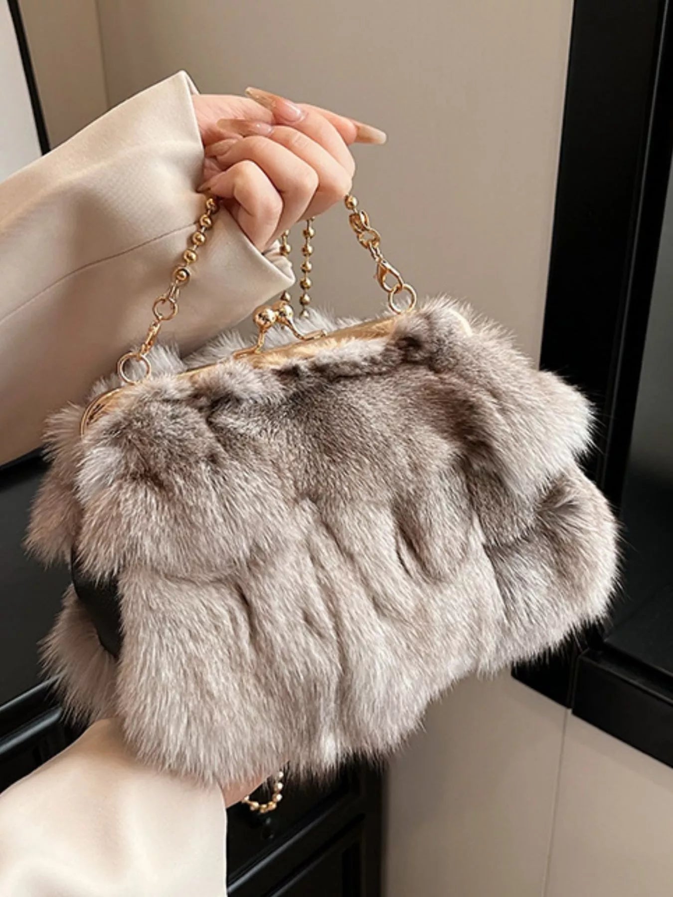 Stylish Furry Chain Crossbody Bag crafted from fox fur, perfect for trendy casual looks.