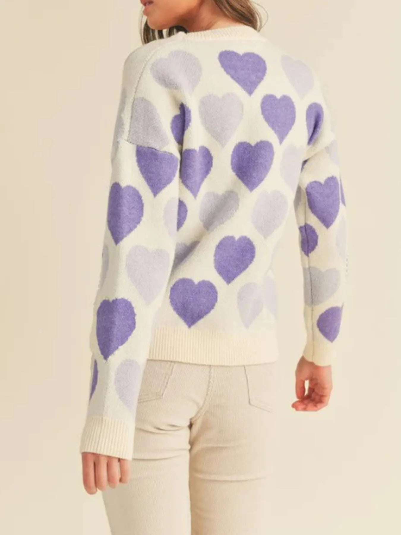 Heart Ribbed Hem Long Sleeve Sweater featuring purple heart patterns on a cream background, perfect for everyday style.