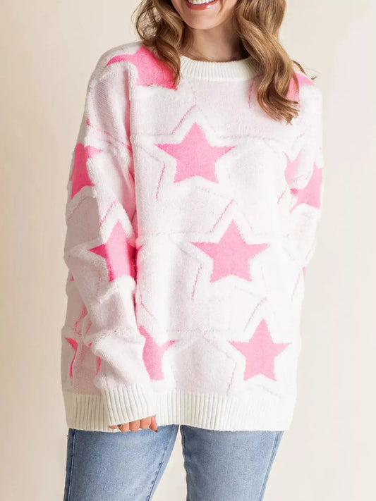 Oversized star pattern ribbed edge drop shoulder sweater in pink and white, featuring a cozy knit design.