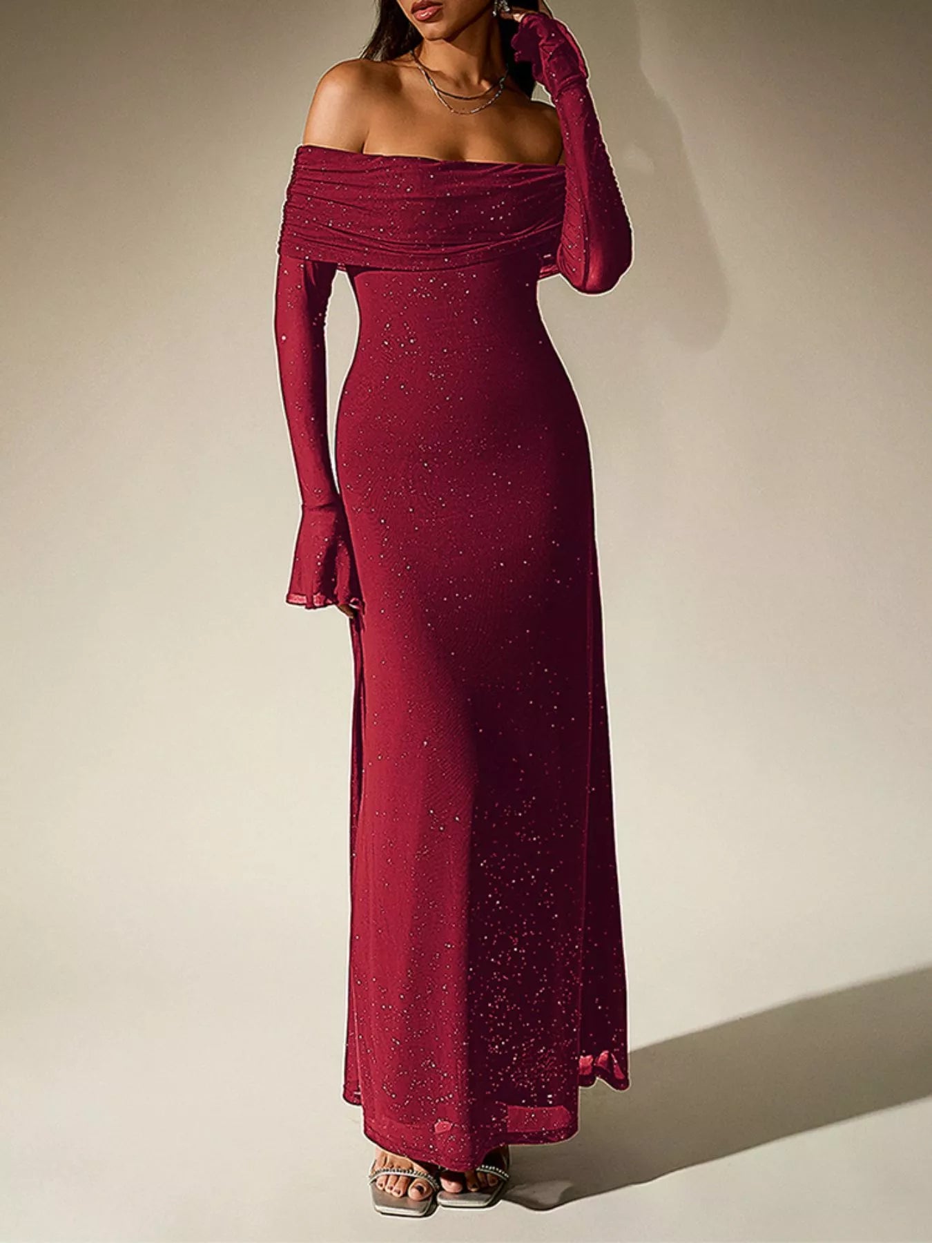 Glitter Off-Shoulder Maxi Dress in burgundy featuring a glittery design and a flattering fit for elegant evening looks.