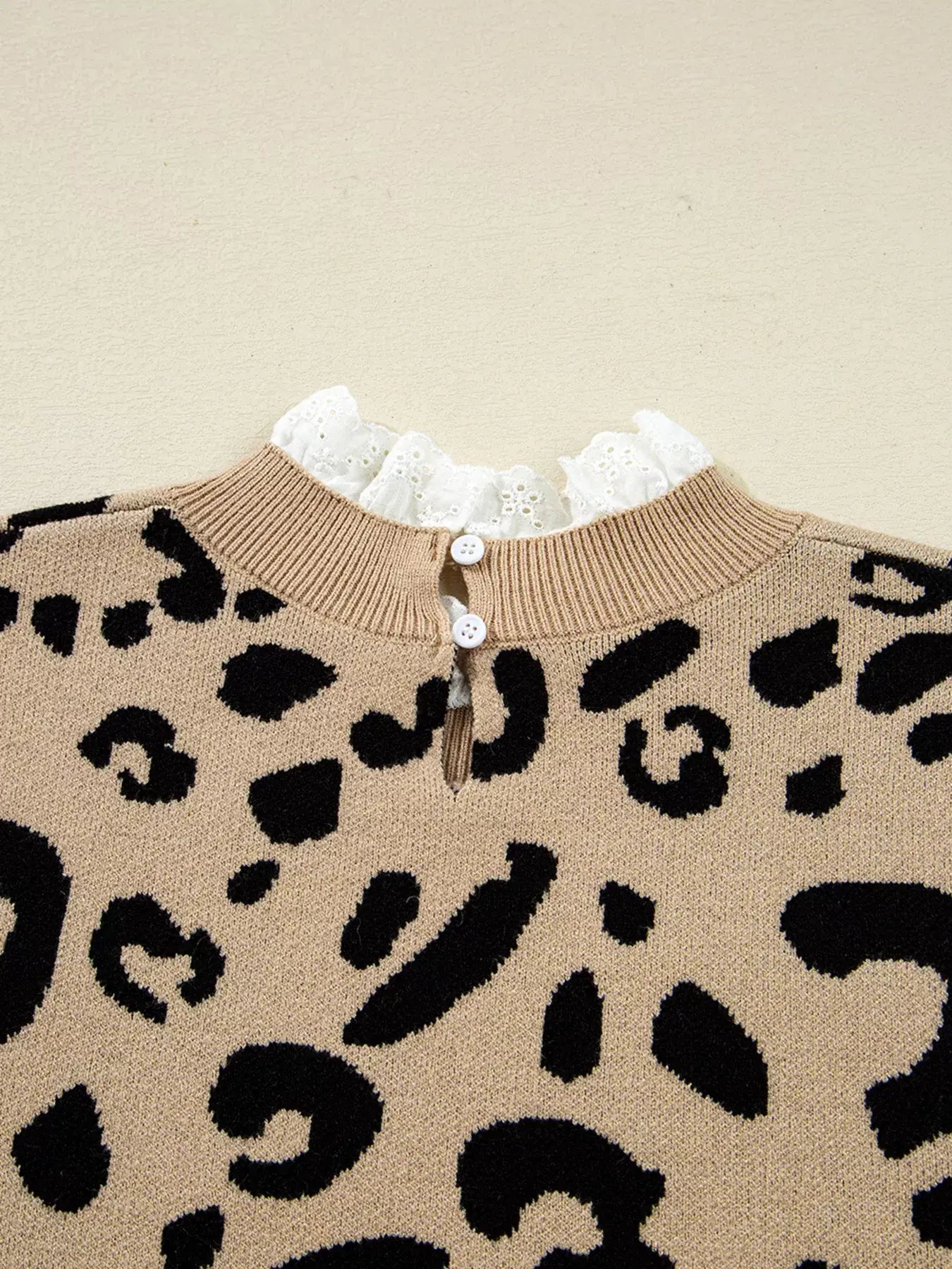 Leopard Pattern Lace Ribbed Detail Button Top close-up of collar and button details on stylish top.