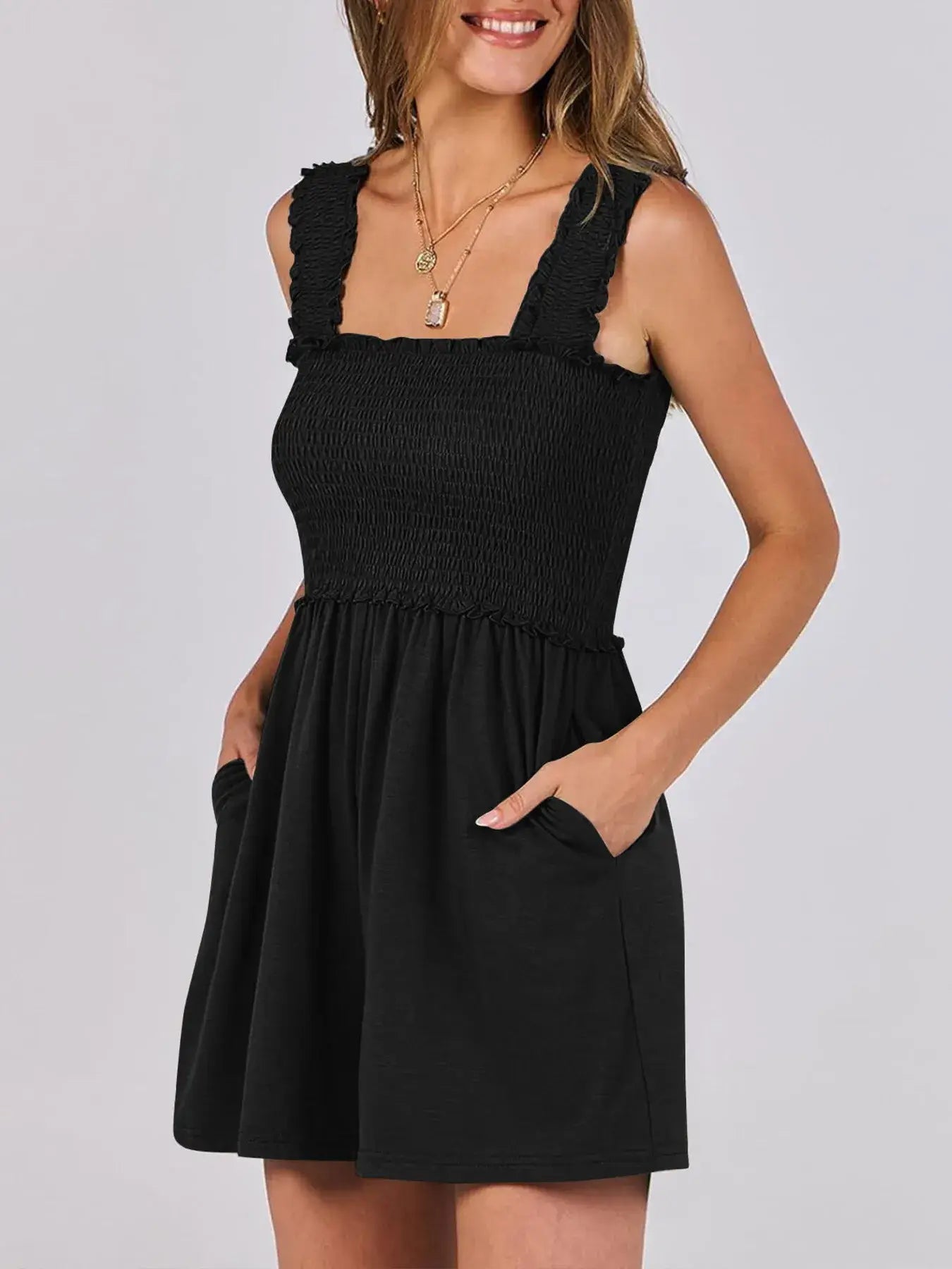 Smocked Square Neck Summer Romper in black with ruffled straps and functional pockets, perfect for summer outings.