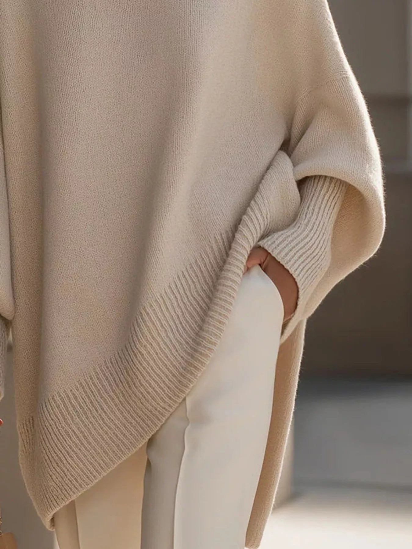 Oversized Batwing Sleeve Knit Sweater for Women, featuring ribbed accents in a soft beige color.