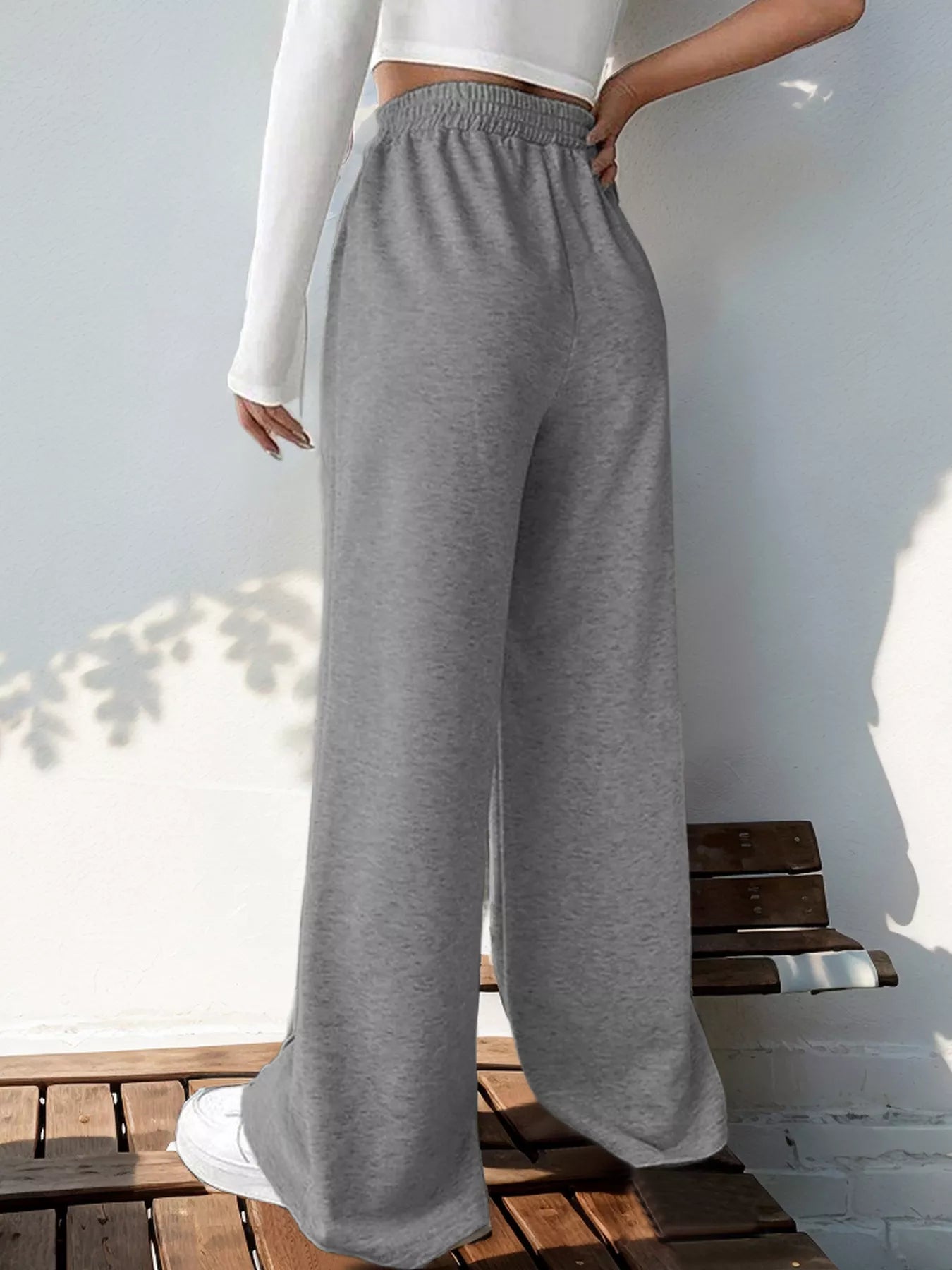 Wide Leg High Waist Pants in gray, showcasing comfortable, elegant fit from the back, perfect for everyday style.