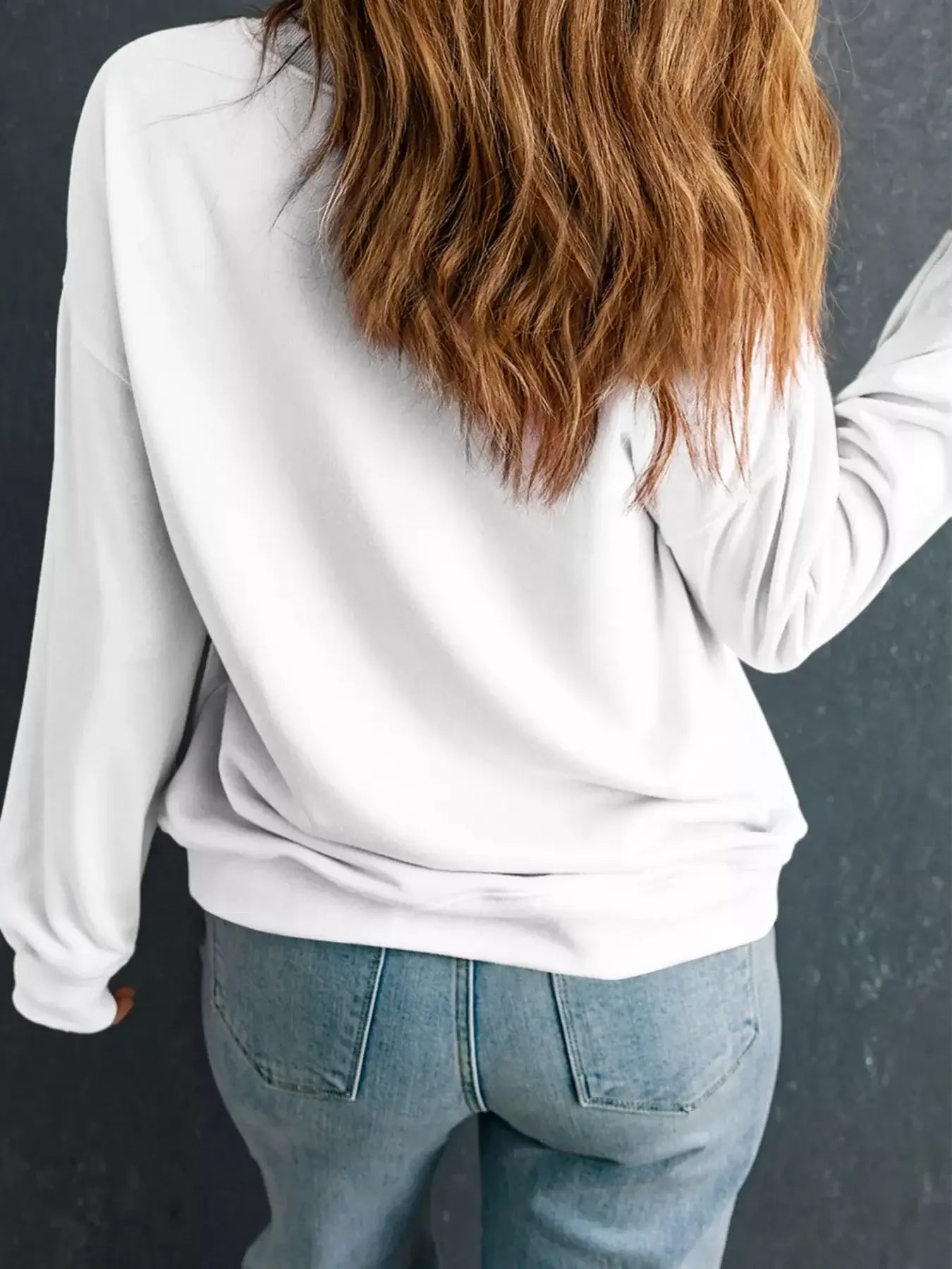 Yummy Pie Graphic Thanksgiving Sweatshirt worn from behind with casual jeans, perfect for cozy fall days.
