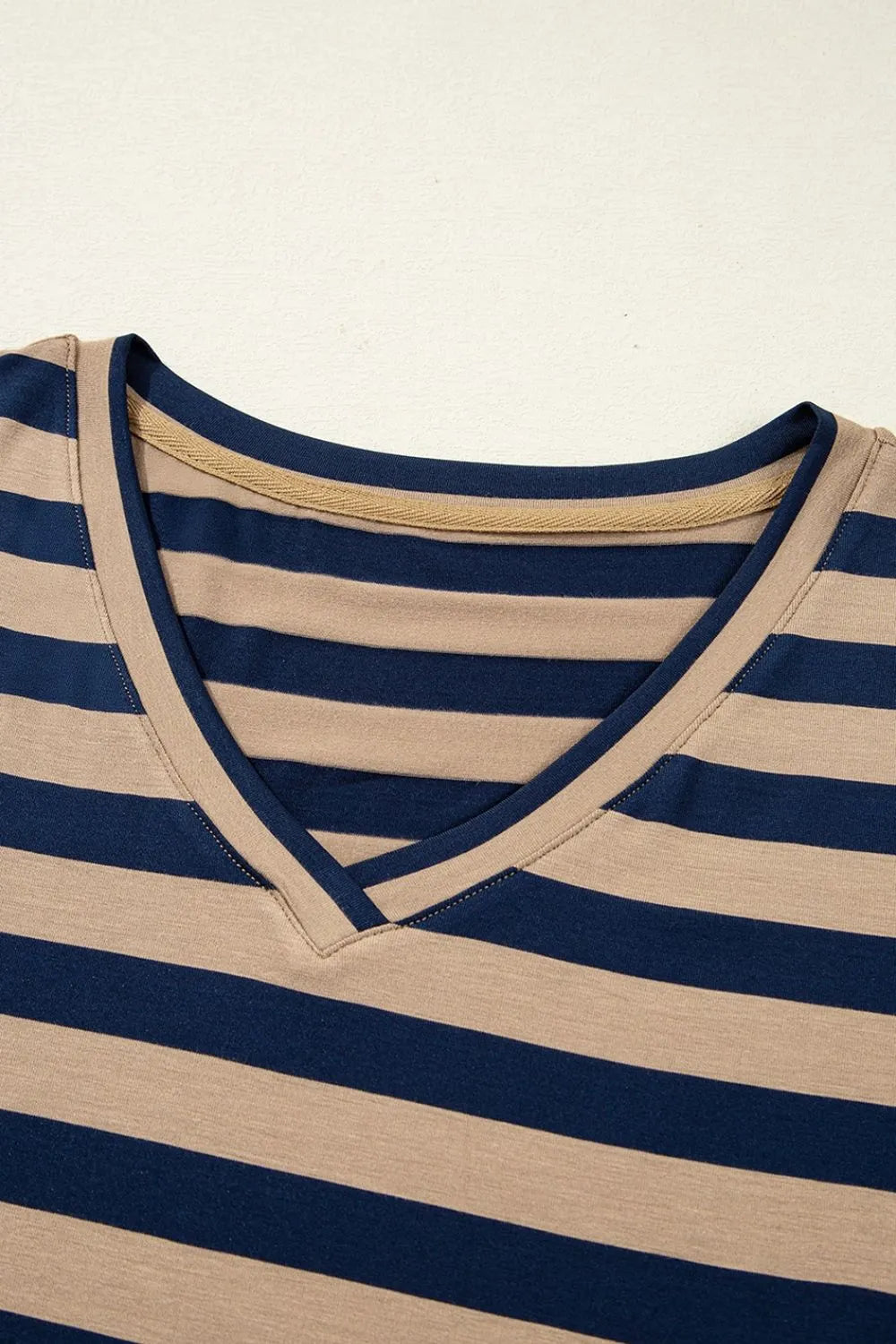 Casual Striped V-Neck Midi T-Shirt Dress with striped pattern in beige and navy blue.