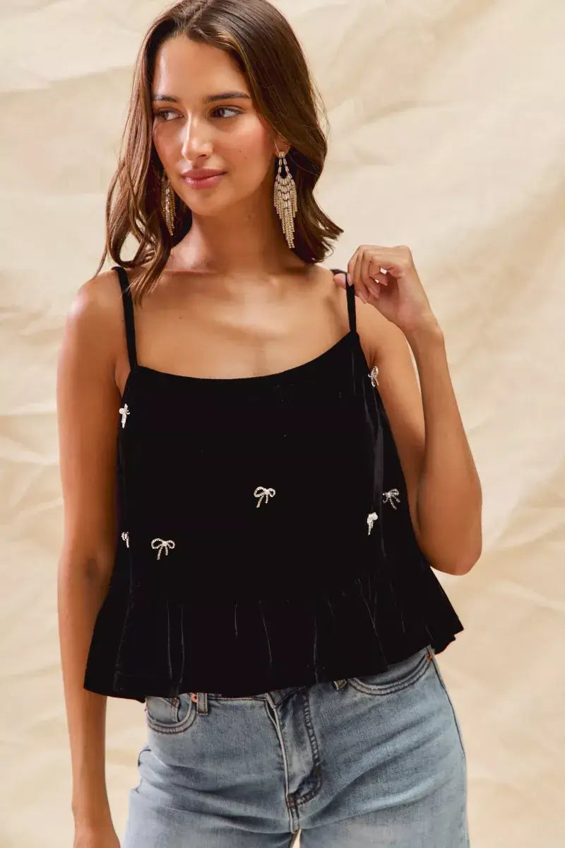 Model wearing the SO ME Holiday Velvet Ribbon Rhinestone Christmas Top, showcasing its elegant design with sparkling accents.