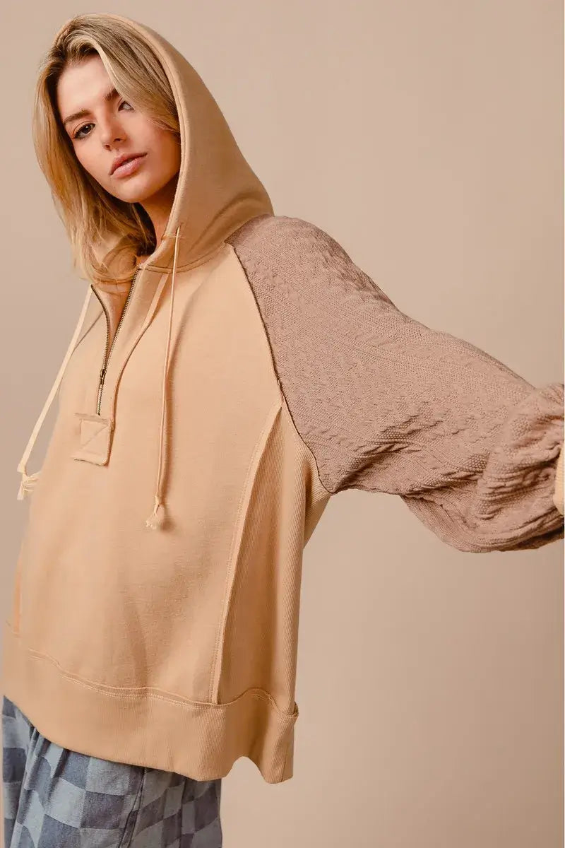 BiBi Half Zip French Terry Hoodie with Knit Sleeves on model, showcasing contemporary style and comfort.