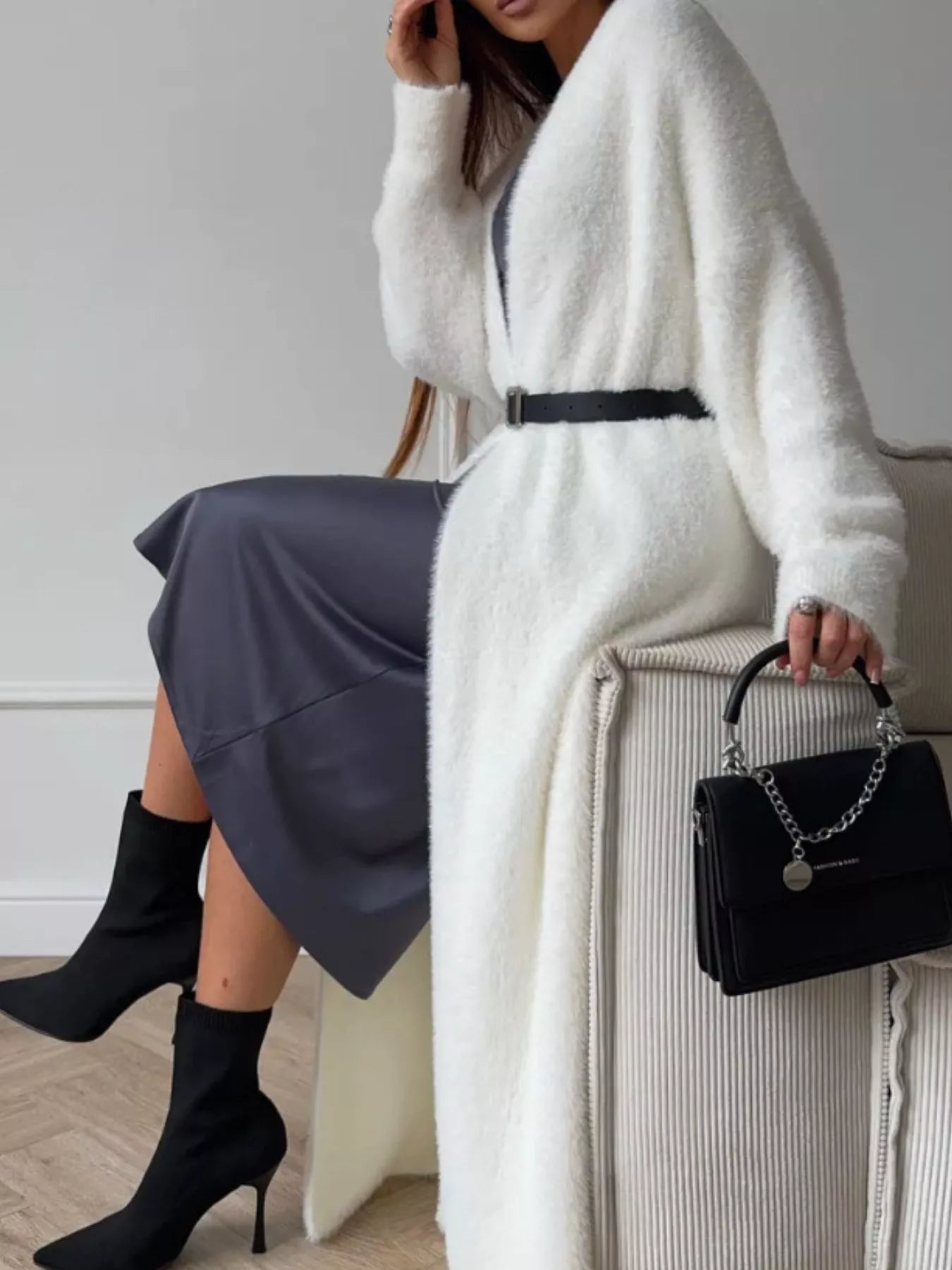 Fuzzy Open Front Longline Cardigan worn over a stylish gray dress with black accessories and boots.