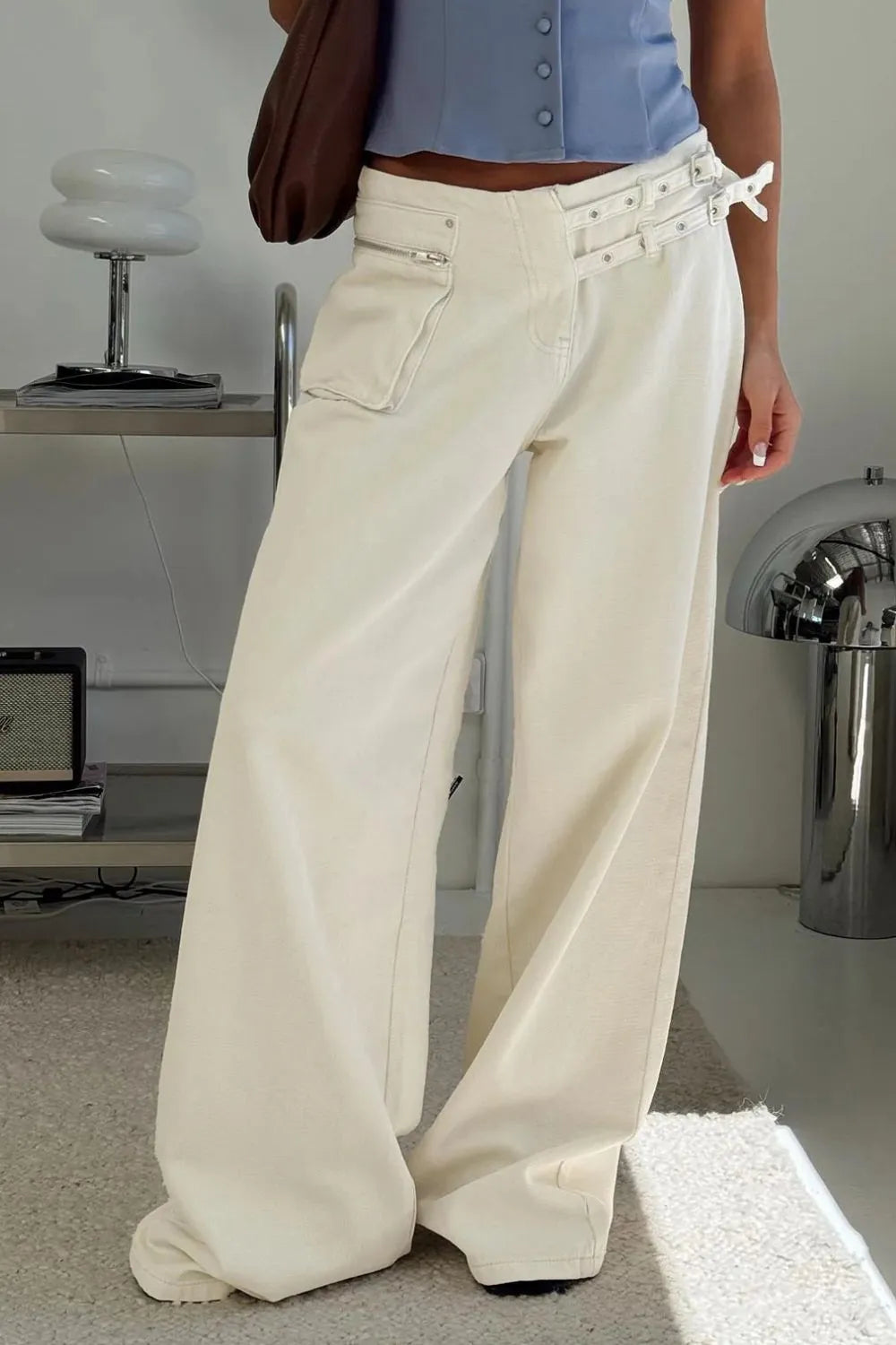 Wide Leg Jeans with Pockets, comfortable everyday wear, featuring stylish pockets in a light color.