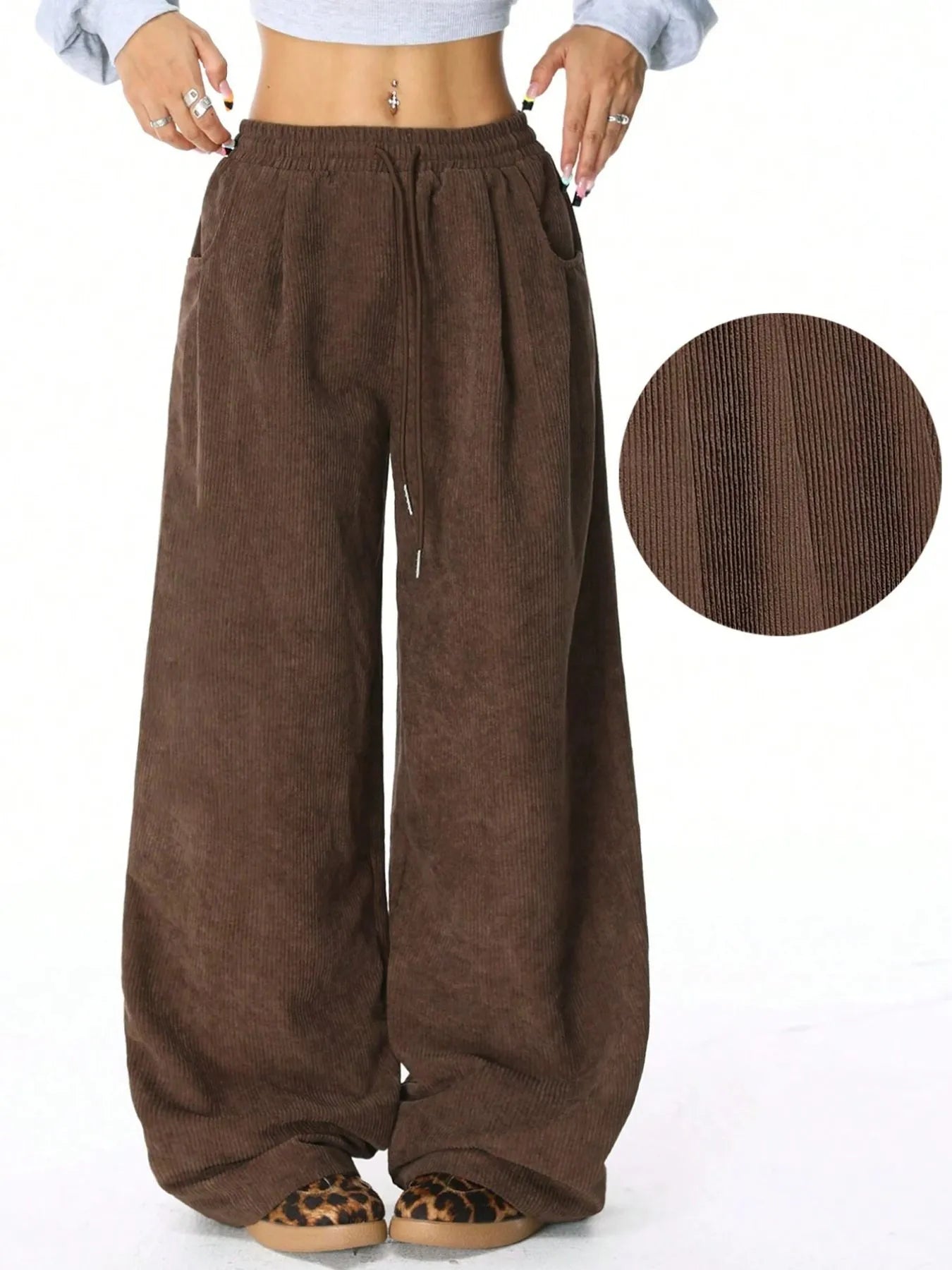 Drawstring Wide Leg Pants in brown with pockets, ideal for relaxed everyday comfort, featuring soft fabric and adjustable waistband.