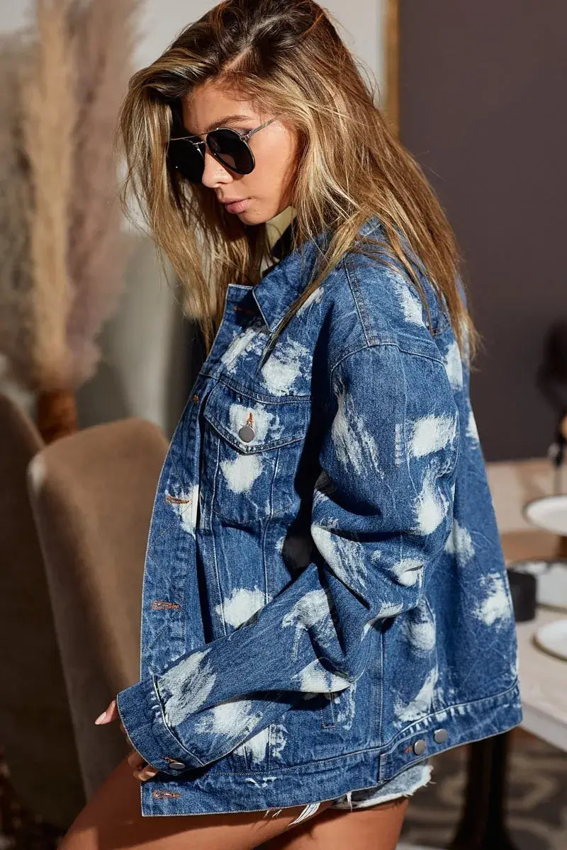 Woman wearing BiBi Washed Tie Dye Oversized Denim Jacket, showcasing a stylish tie-dye pattern and relaxed fit.