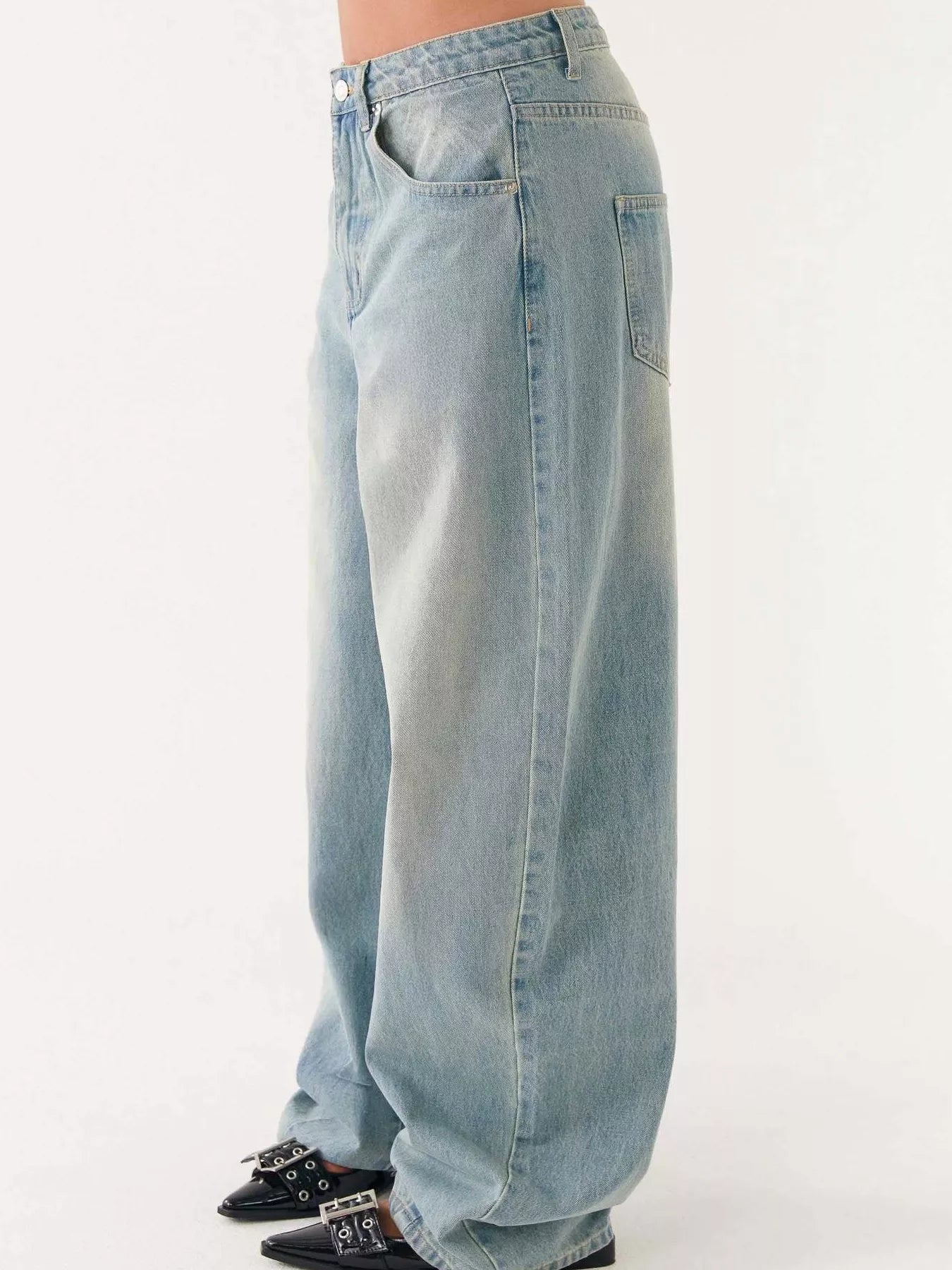 Button Up Denim Jacket and Jeans Set featuring stylish wide-leg jeans in light wash denim.