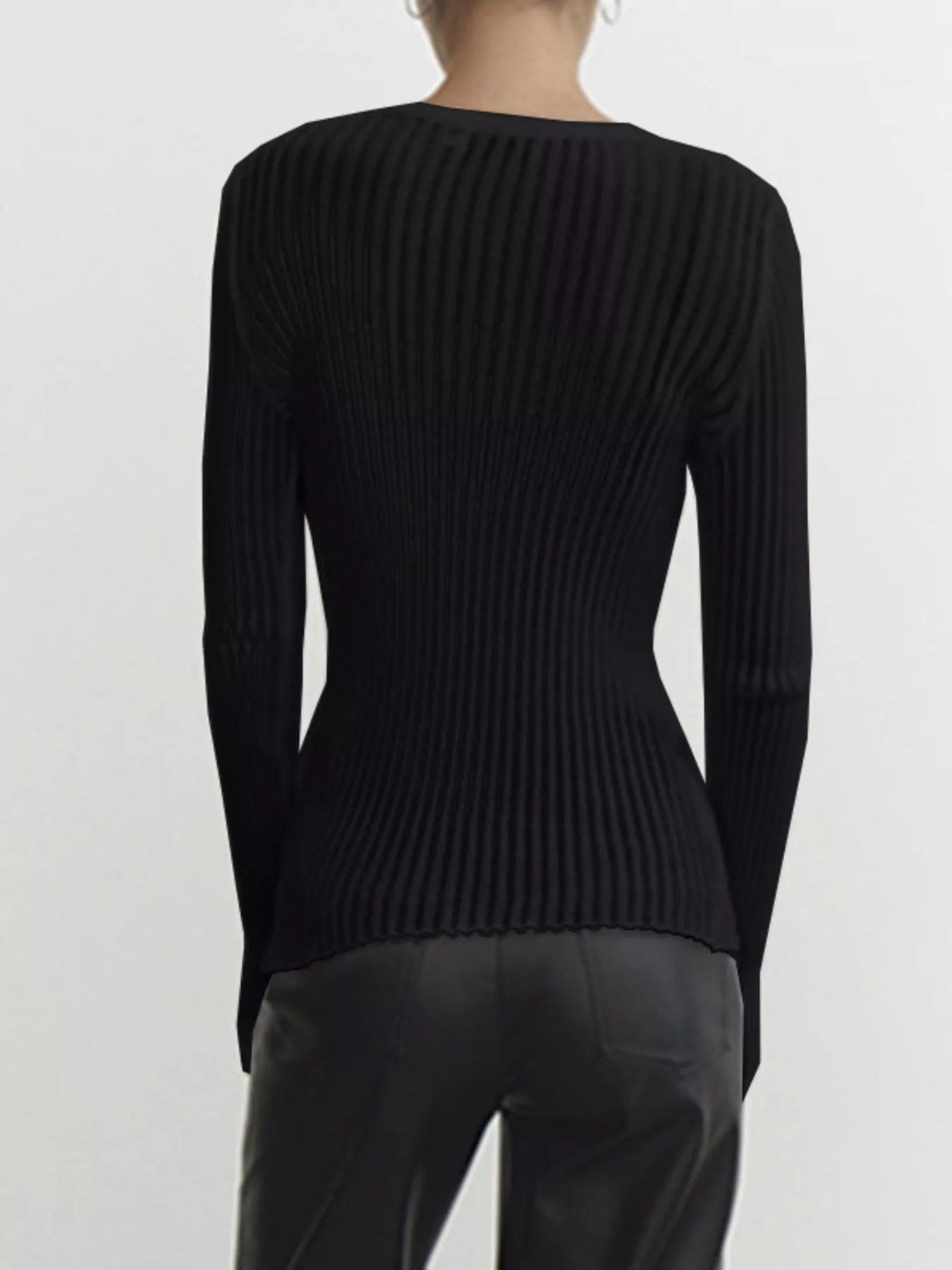 Ribbed Knit Long Sleeve Top showcased from the back, featuring a sleek black design and ribbed texture.