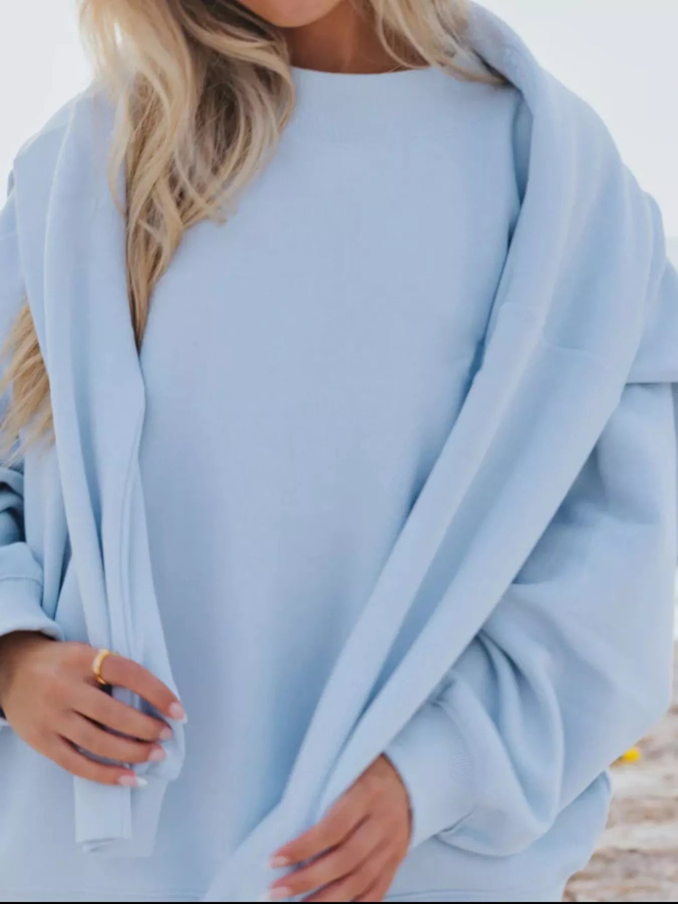 Relaxed Fit Round Neck Sweatshirt and Shorts Set in light blue color, showcasing basic style and slightly stretchy fabric.