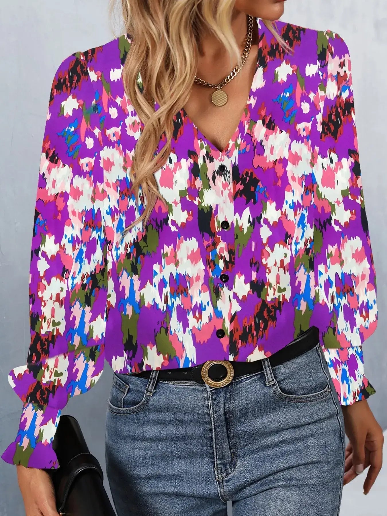 Printed button up long sleeve shirt in vibrant floral design, perfect for casual and smart occasions.