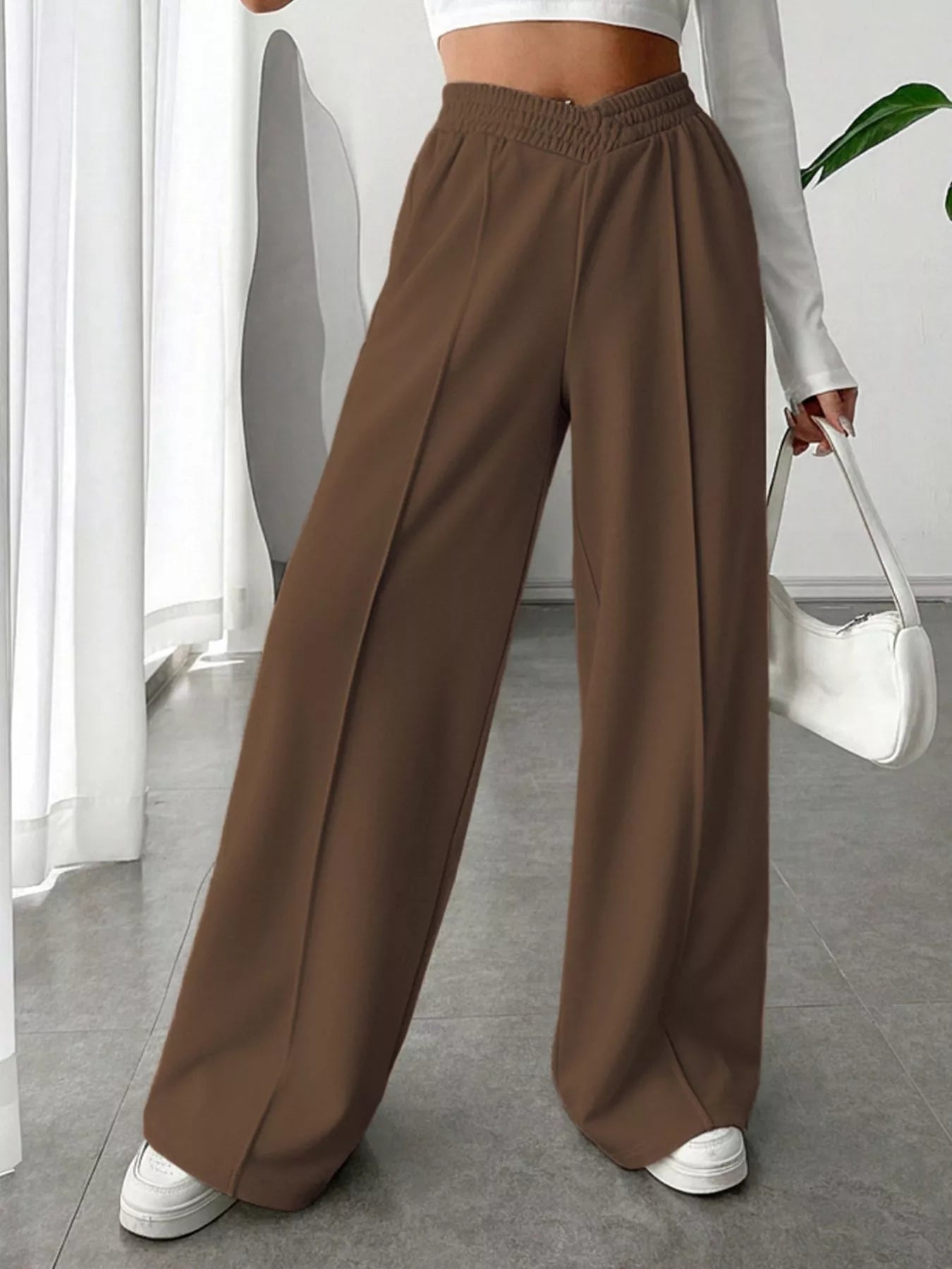Wide Leg High Waist Pants in brown, featuring a comfortable elastic waist, ideal for elegant everyday style.