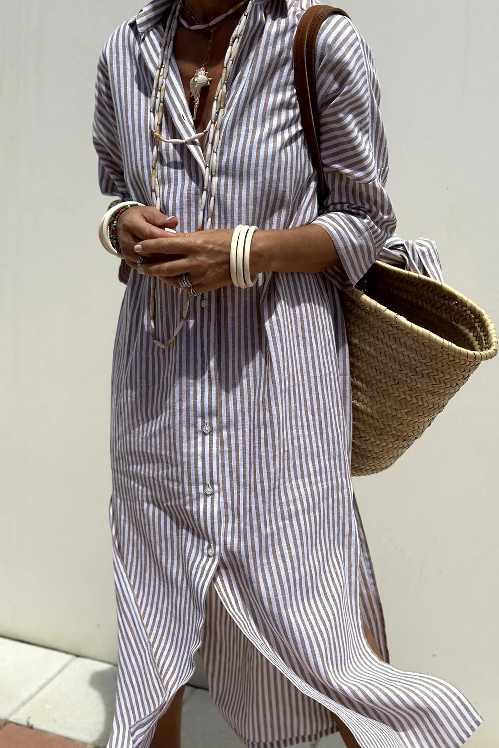 Tied Button Up Three-Quarter Sleeve Dress for Women with striped pattern and accessories.