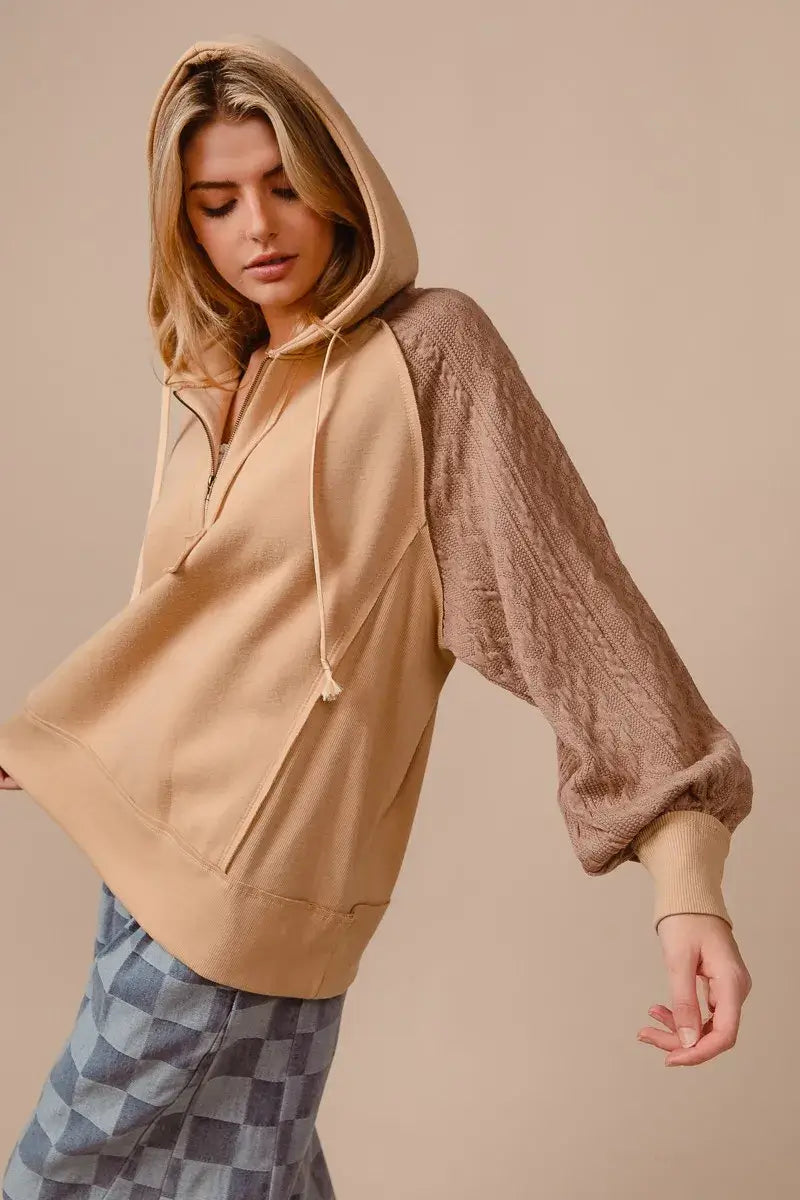 BiBi Half Zip French Terry Hoodie with Knit Sleeves in beige with knit sleeves, perfect for casual layering and stylish comfort.