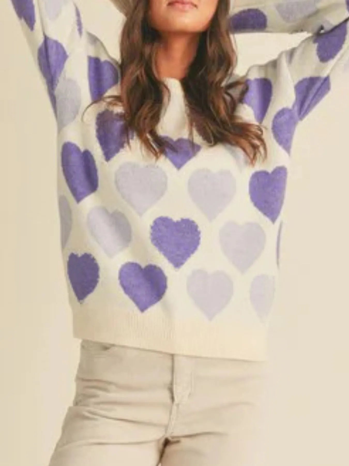 Heart Ribbed Hem Long Sleeve Sweater featuring a playful heart pattern in shades of purple.