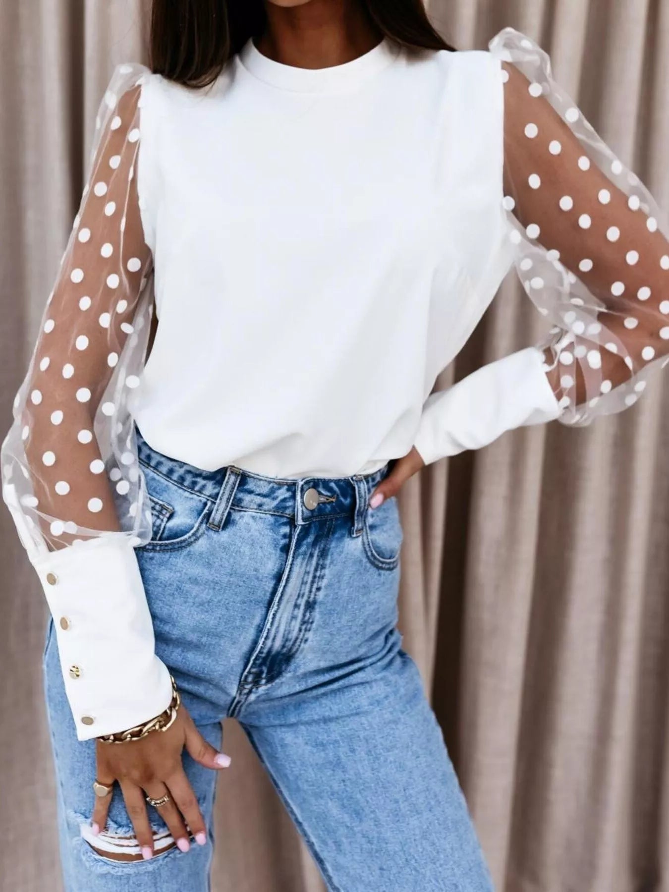 Polka Dot Mesh Sleeve Blouse elegant sheer women top featuring polka dot mesh sleeves and white body.