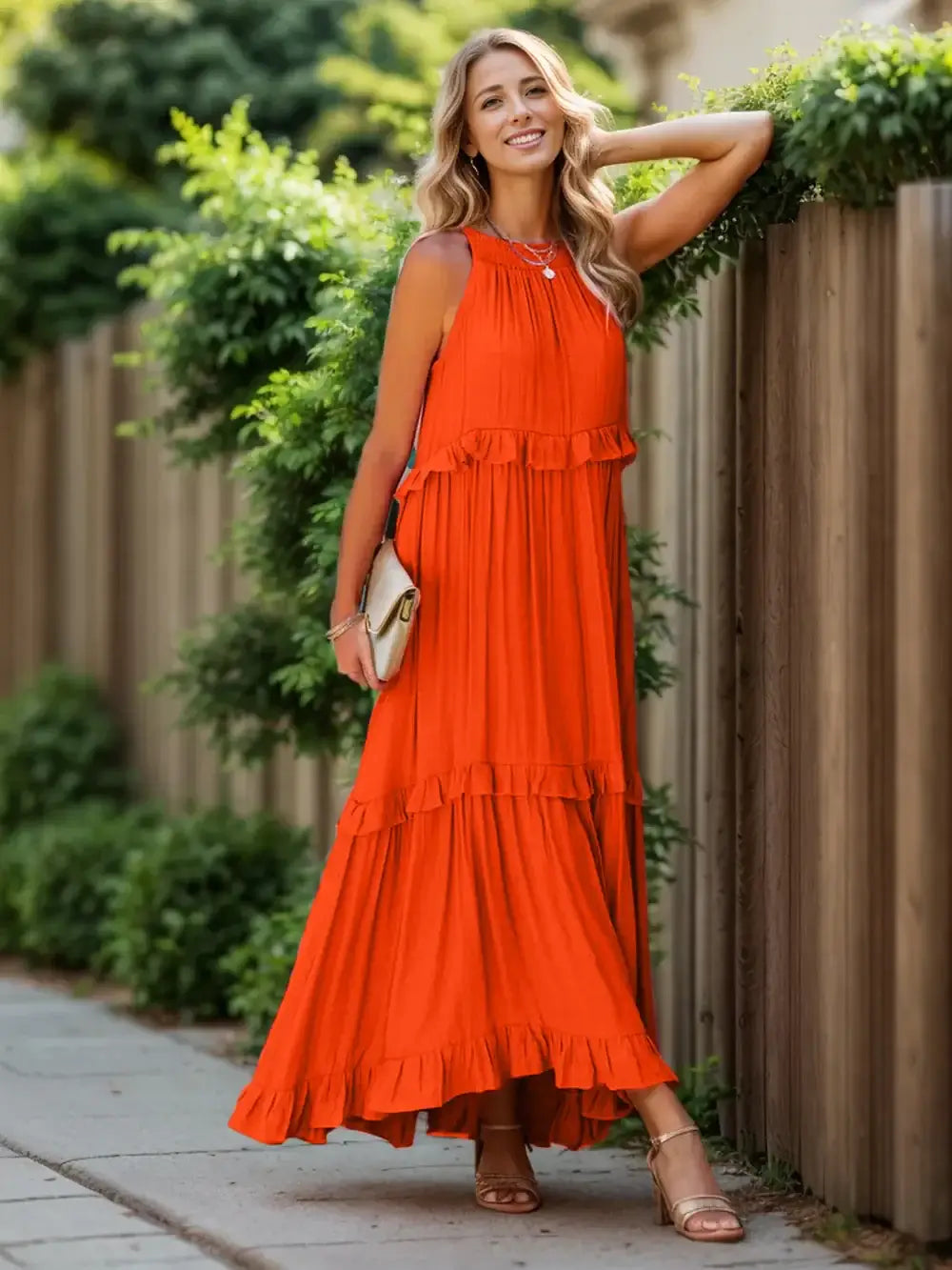 Ruffled Sleeveless Tiered Maxi Dress with Pockets in vibrant orange, showcasing elegance and comfort for casual outings.