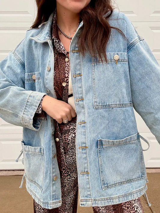 Patched pockets side tie denim jacket for women, showcasing a trendy and casual style.