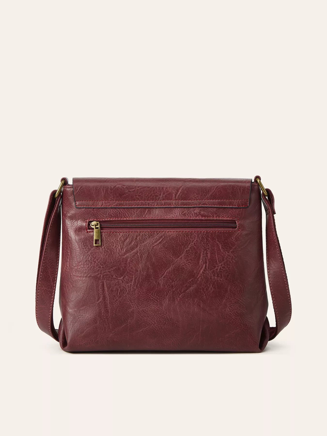 Vintage Buckle Flap Crossbody Bag in burgundy PU leather with adjustable strap and zipped pocket.