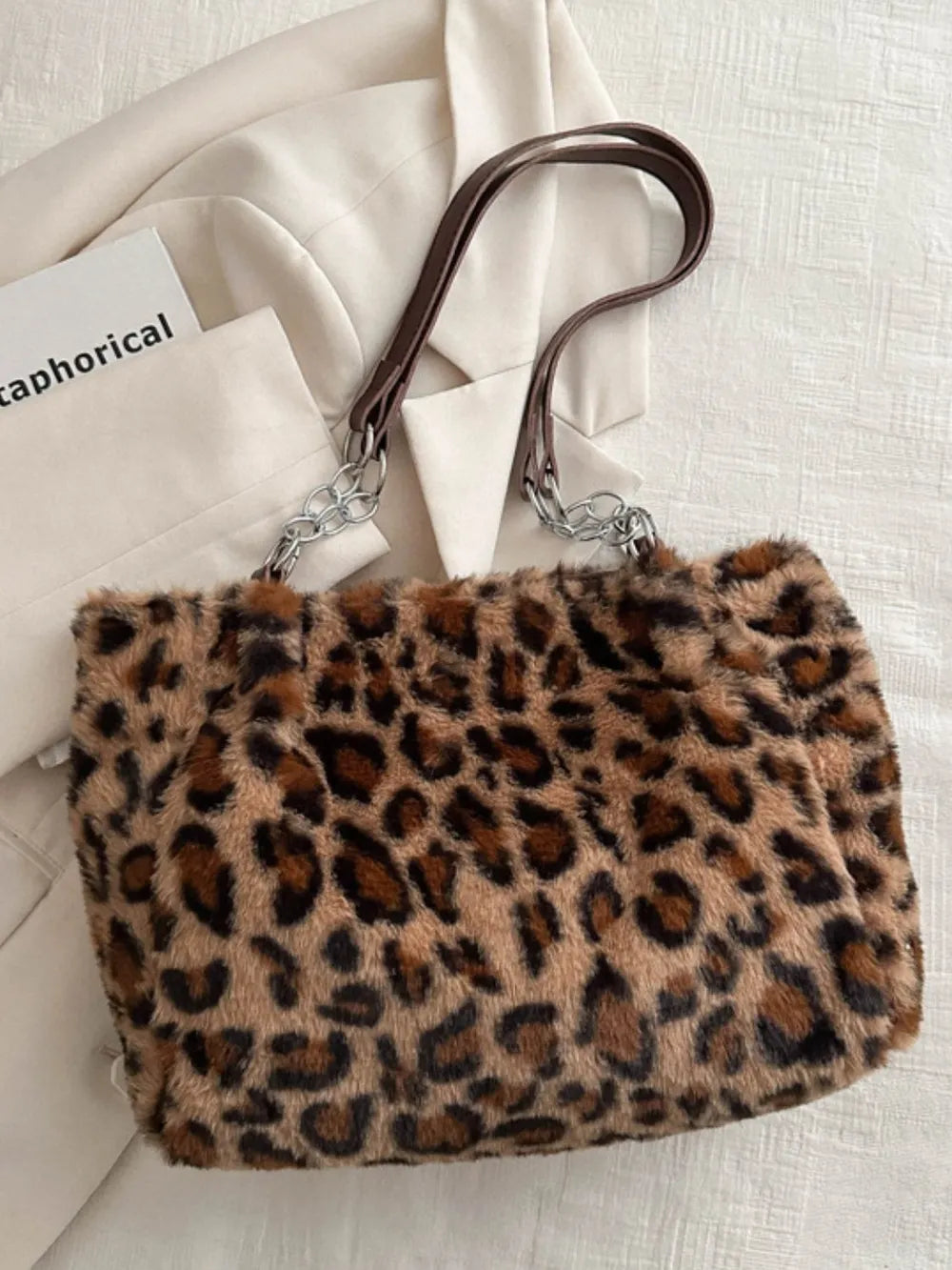 Faux Fur Leopard Shoulder Bag showcasing a bold design with luxurious faux fur and stylish straps.