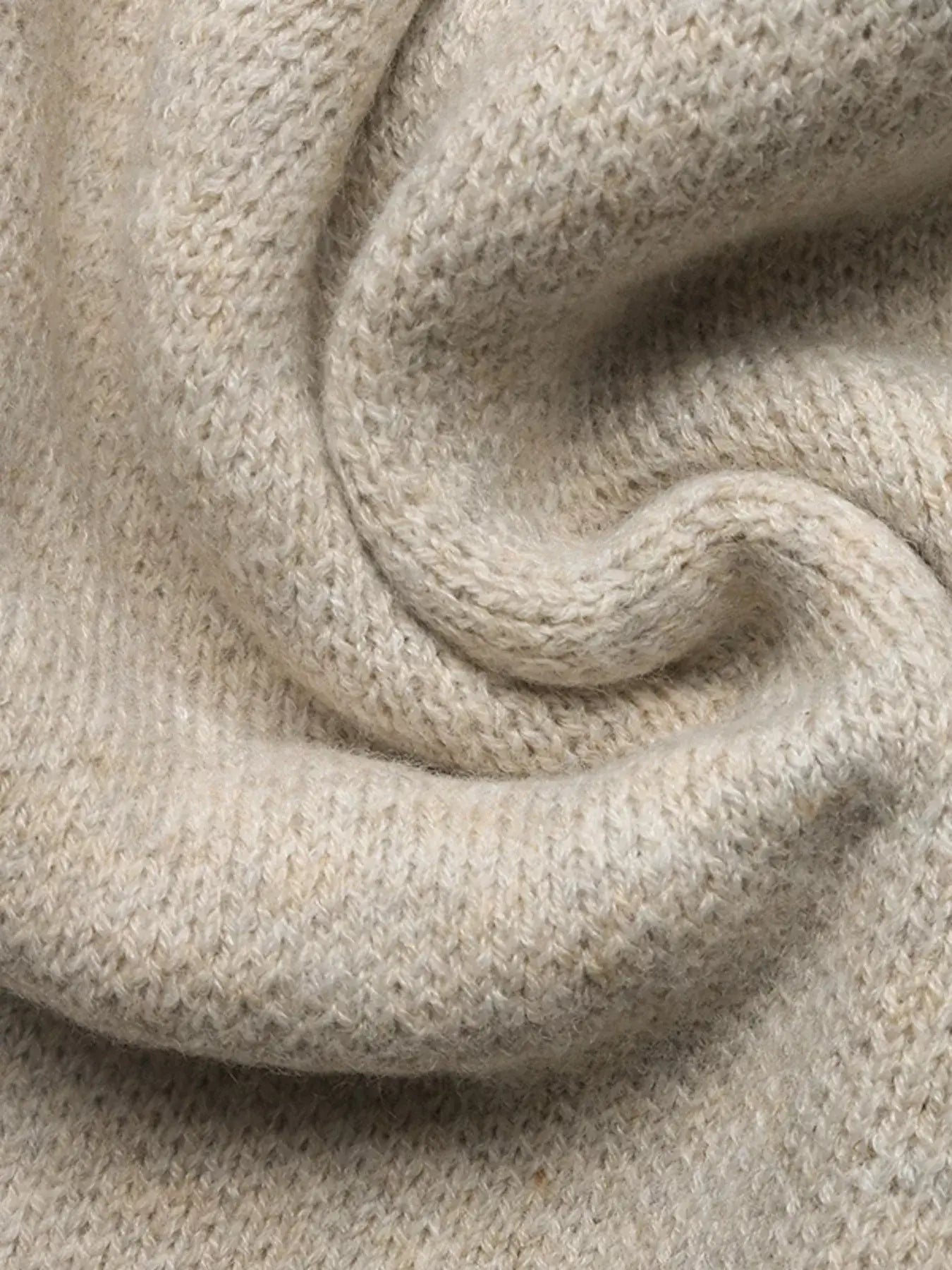 Close-up of soft fabric showcasing the texture of the Zip Up Contrast Trim Cardigan.