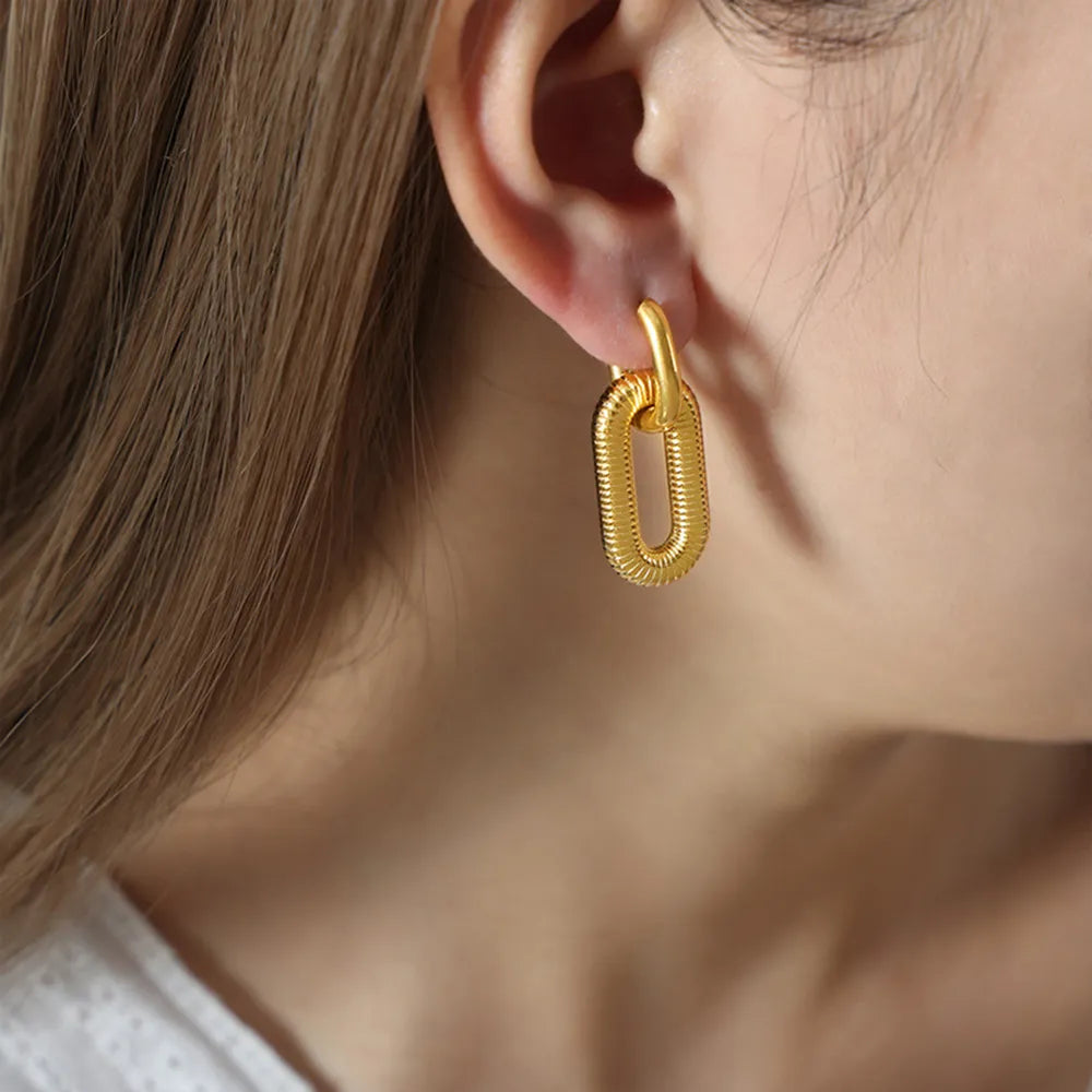 Titanium Steel Dangle Earrings showcasing a refined, modern elegant style with 18K gold plating.
