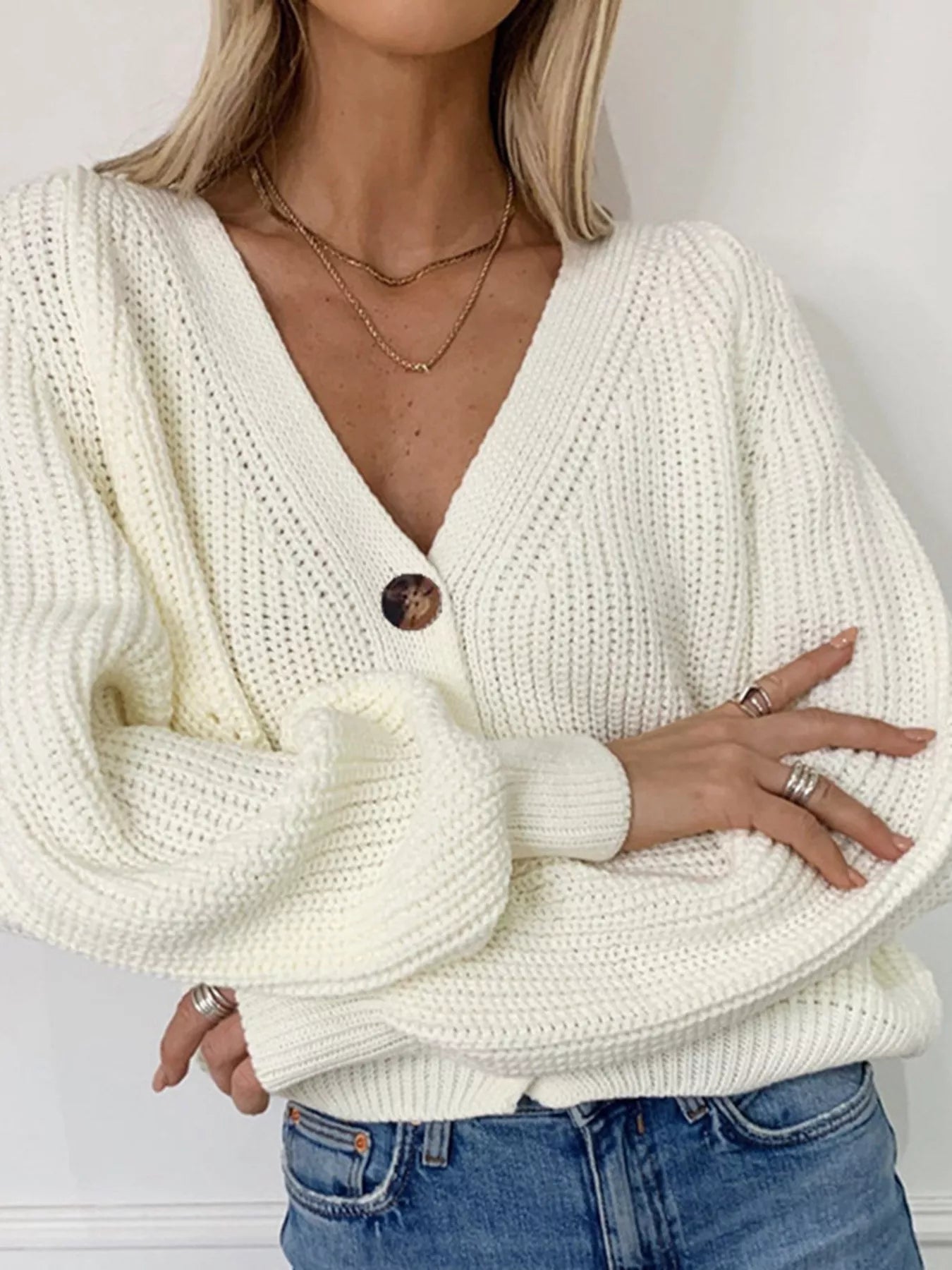 Chunky Knit Button Down Cardigan showcasing a cozy layered style with a buttoned front and relaxed sleeves.