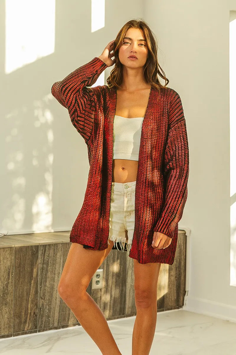BiBi Metallic Knit V-neck Open Sweater Cardigan in red, styled with a crop top and shorts, showcasing a chic layering look.