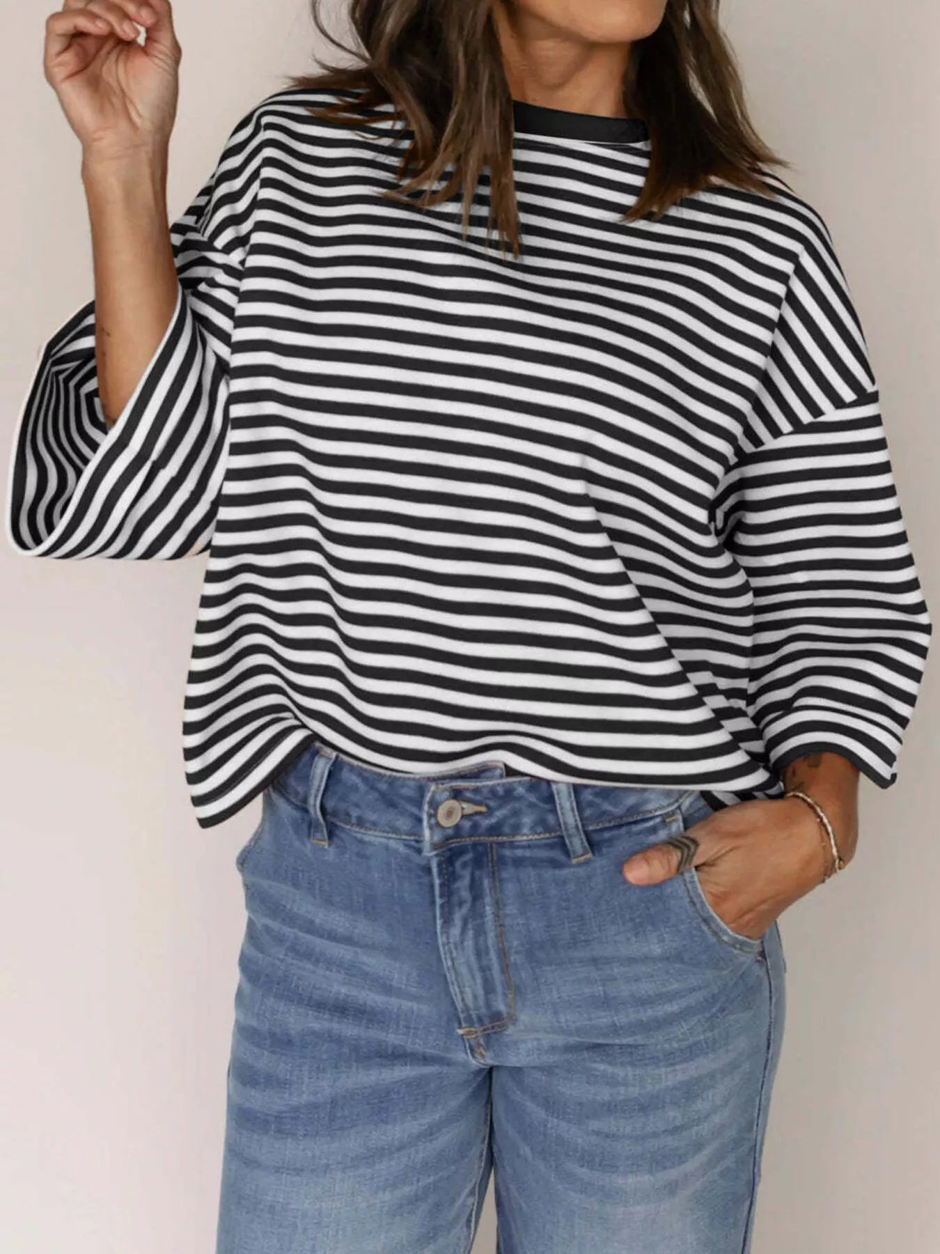 Striped Back Bow Tie T-Shirt featuring a casual oversized design with black and white stripes.
