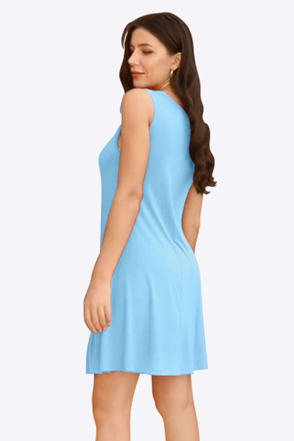 Model wearing a sleeveless blue round neck mini dress with pockets, showcasing a casual and comfortable style.