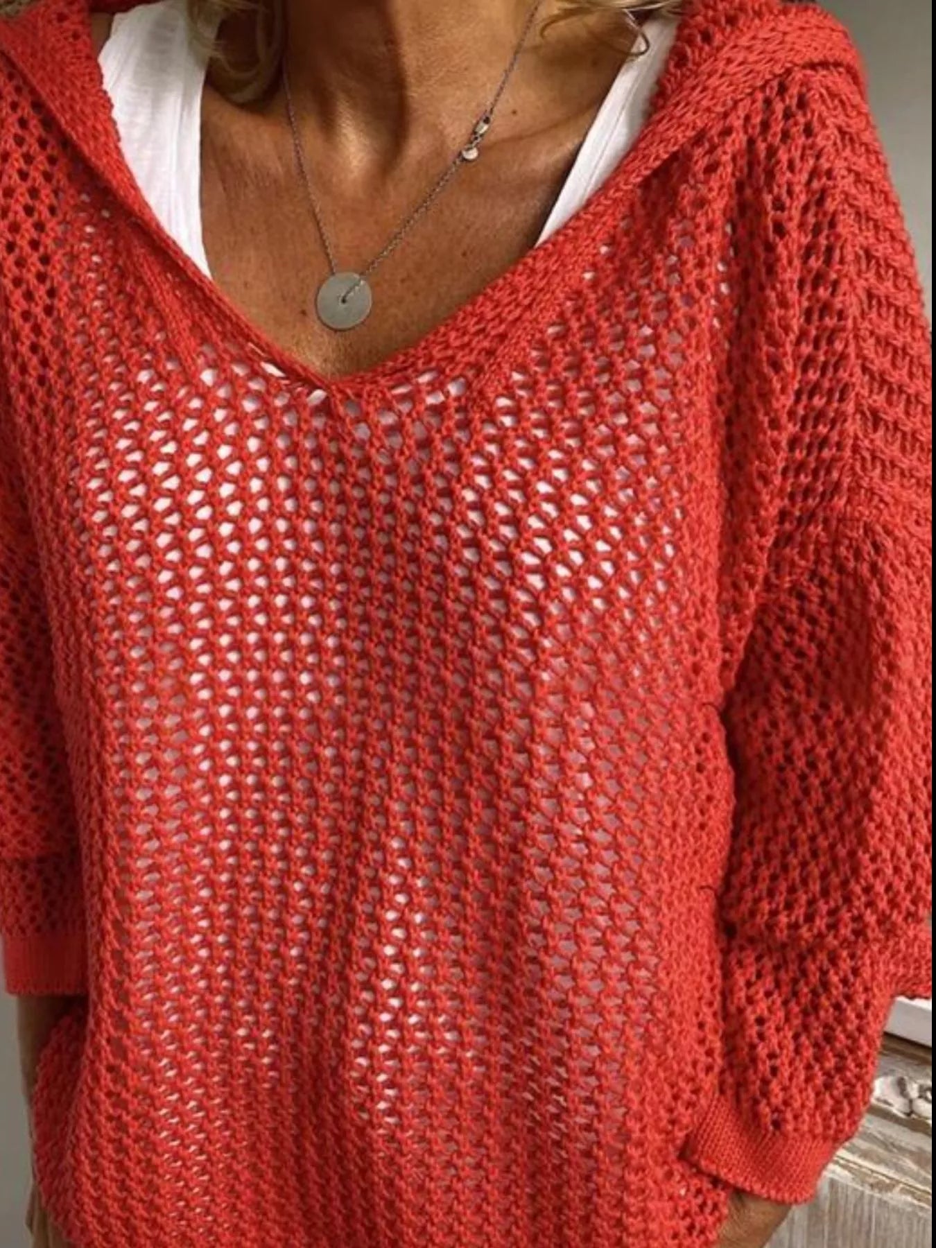 Crochet Hooded Knit Cover Up in vibrant coral color, featuring a wide neckline and breathable knit design.