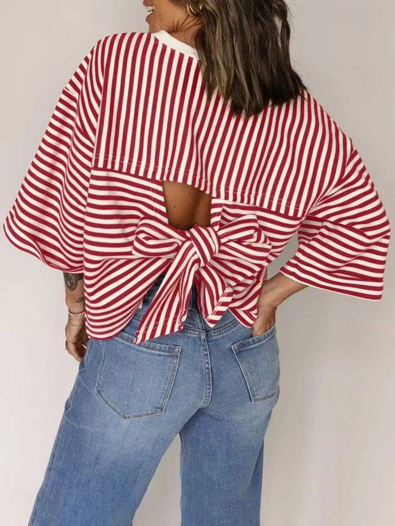 Striped Back Bow Tie T-Shirt featuring oversized fit and vibrant red stripes, perfect for casual everyday style.