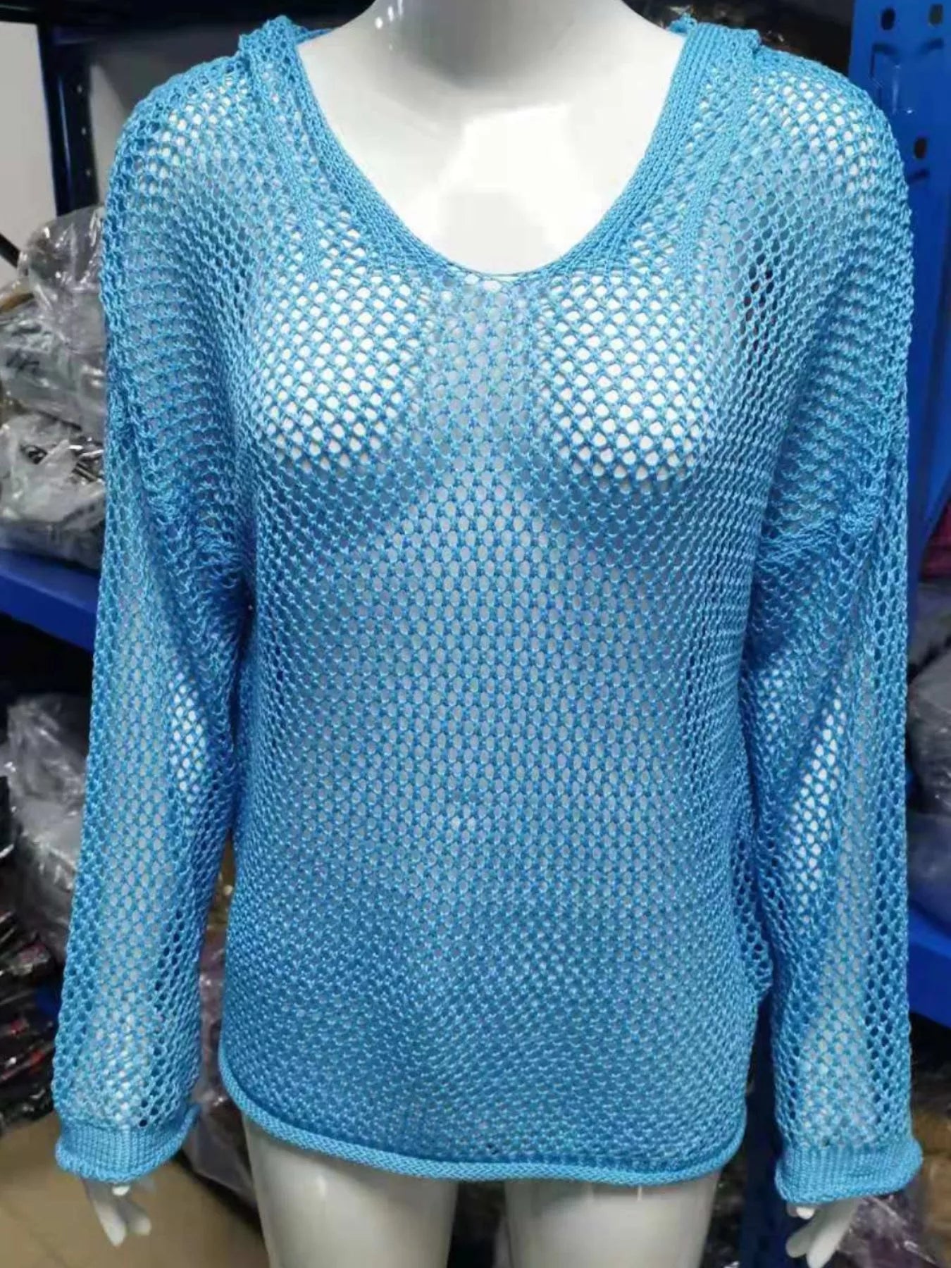 Crochet Hooded Knit Cover Up in light blue color with open weave design, perfect for stylish layered looks.