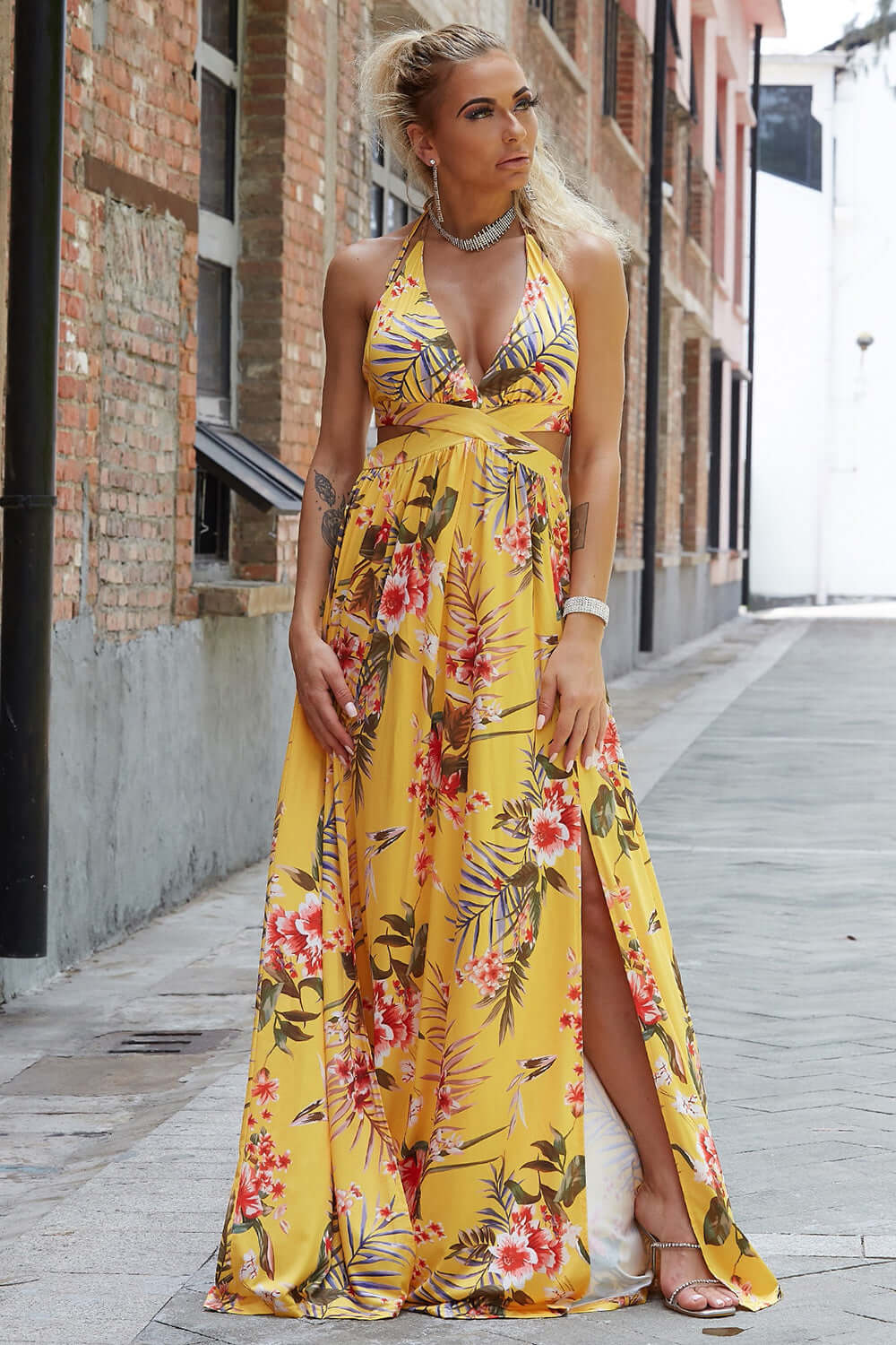 Halter Neck Split Dress showcasing floral design, ideal for evening events with elegant silhouette and stylish front slit.