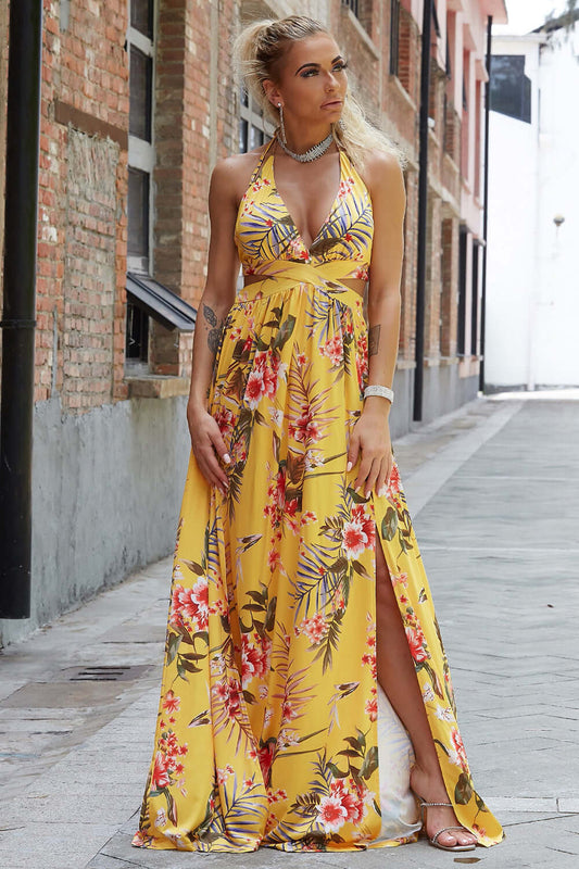 Halter Neck Split Dress showcasing floral design, ideal for evening events with elegant silhouette and stylish front slit.