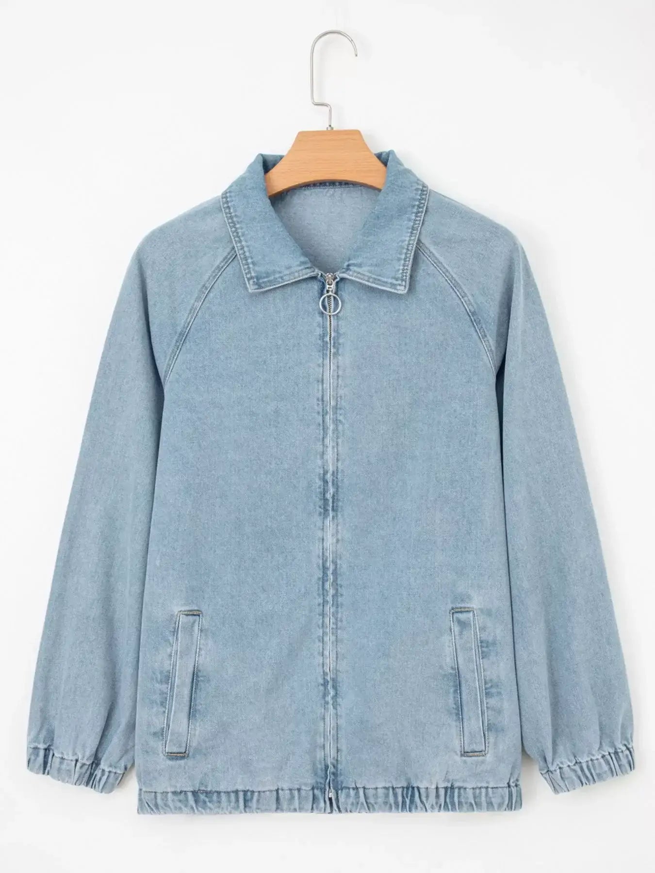 Elastic edge collared zip up denim jacket with pockets, perfect for layering and stylish comfort.