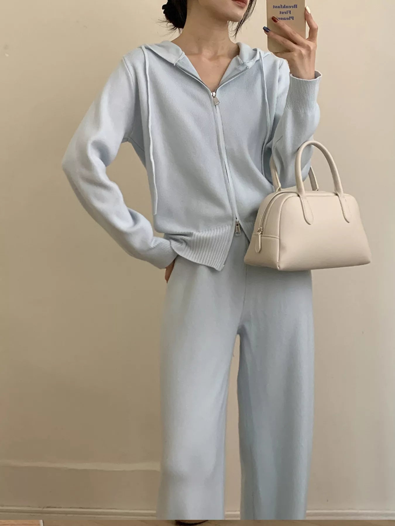 Zip Up Cardigan and Wide Leg Pants Knit Set – Women's Two Piece Outfit featuring a light blue zipper cardigan and matching wide leg pants.