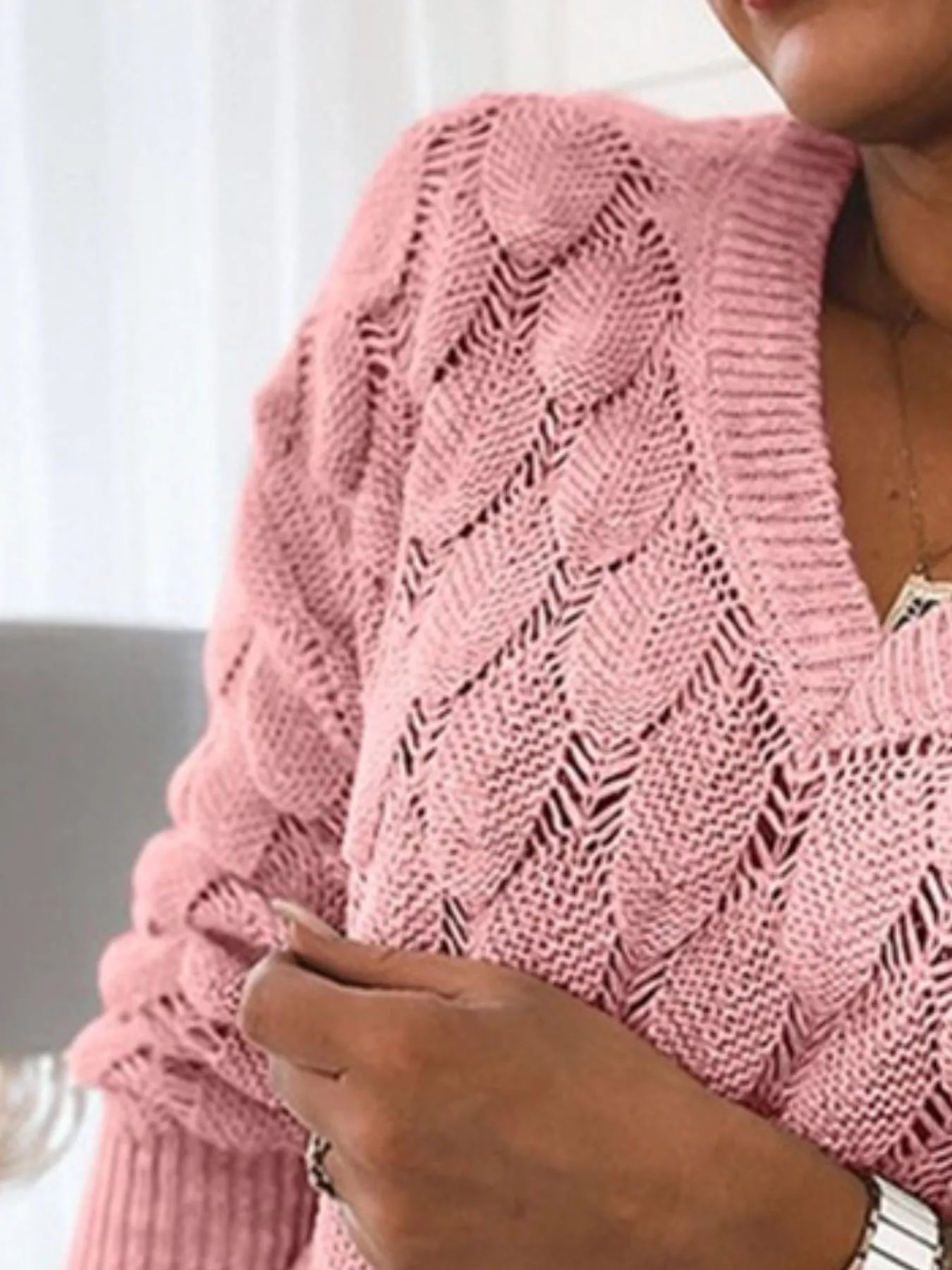 V-Neck Knitted Sweater in pink with openwork knit design, perfect for everyday style.